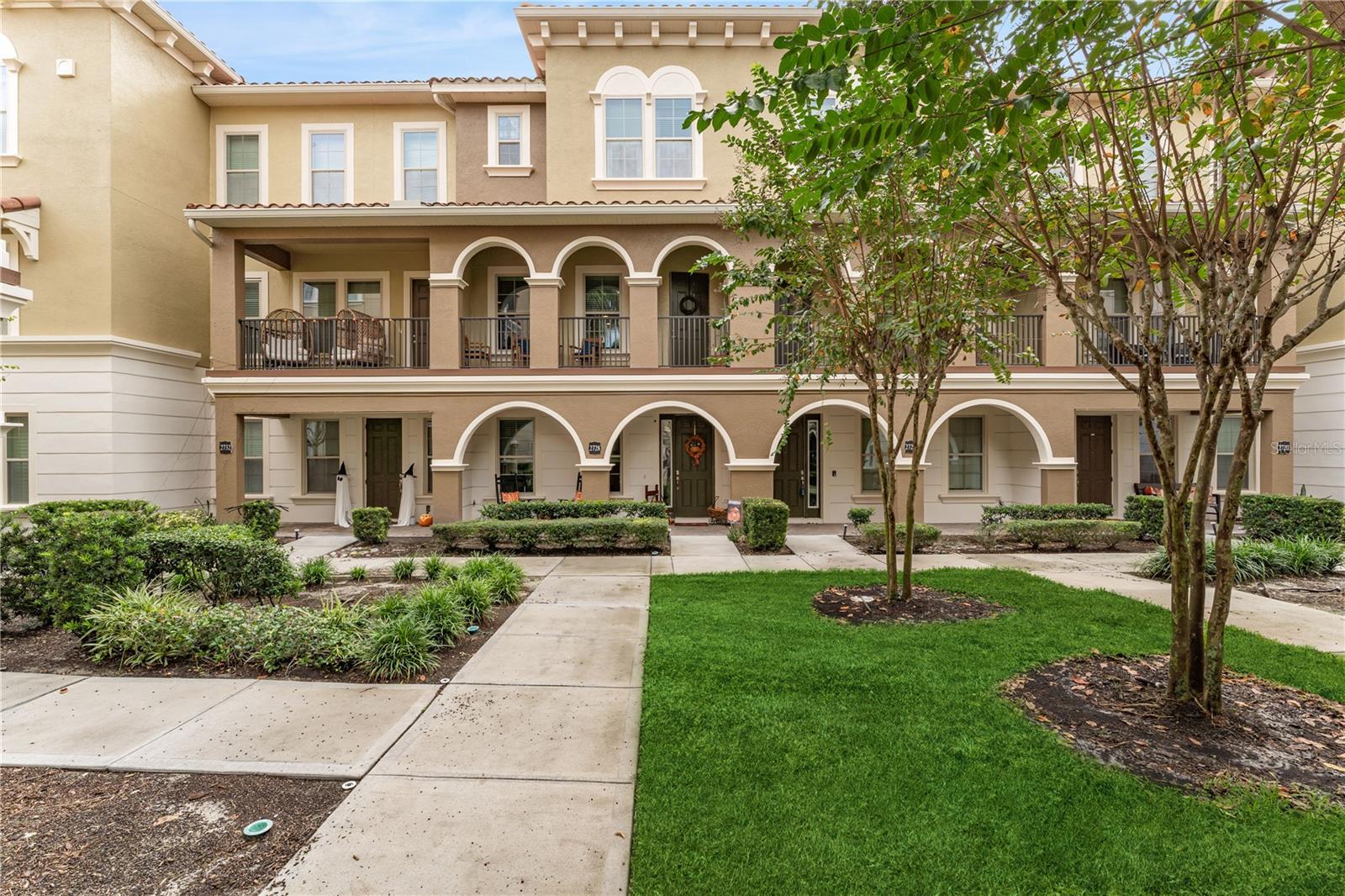 Welcome to resort style living at its finest! This beautiful 3 bedroom, 3 1/2 bathroom townhouse is well situated in the neighborhood, with CONSERVATION behind, and a beautiful COURTYARD VIEW in front. Ceramic tile and luxury vinyl plank flooring offer ease of living, and easy care. The open concept main floor is perfect for entertaining. A large modern kitchen with oversized island seating, beautiful dining area with built in bar area overlooking conservation, and a spacious living room with a balcony view offer the perfect setting for any gathering. A large balcony off the living room offers plenty of room for outdoor seating, to enjoy the beautifully landscaped courtyard. All of this within the luxury resort style community of Fountain Parke. The architecture, landscaping, and amenities this neighborhood offers are next level, making it one of the nicest communities in Central Florida. Amenities include 24 hour guard gate, resort style Mediterranean pool and spa, fitness facilities, tennis and pickleball court, large fenced in dog park, putting green, and a clubhouse with pool table. The neighborhood is well located, with easy access to shops and restaurants, the Seminole Bike Trail, as well as I4 and the Central Florida Greeneway. Book your showing today!
