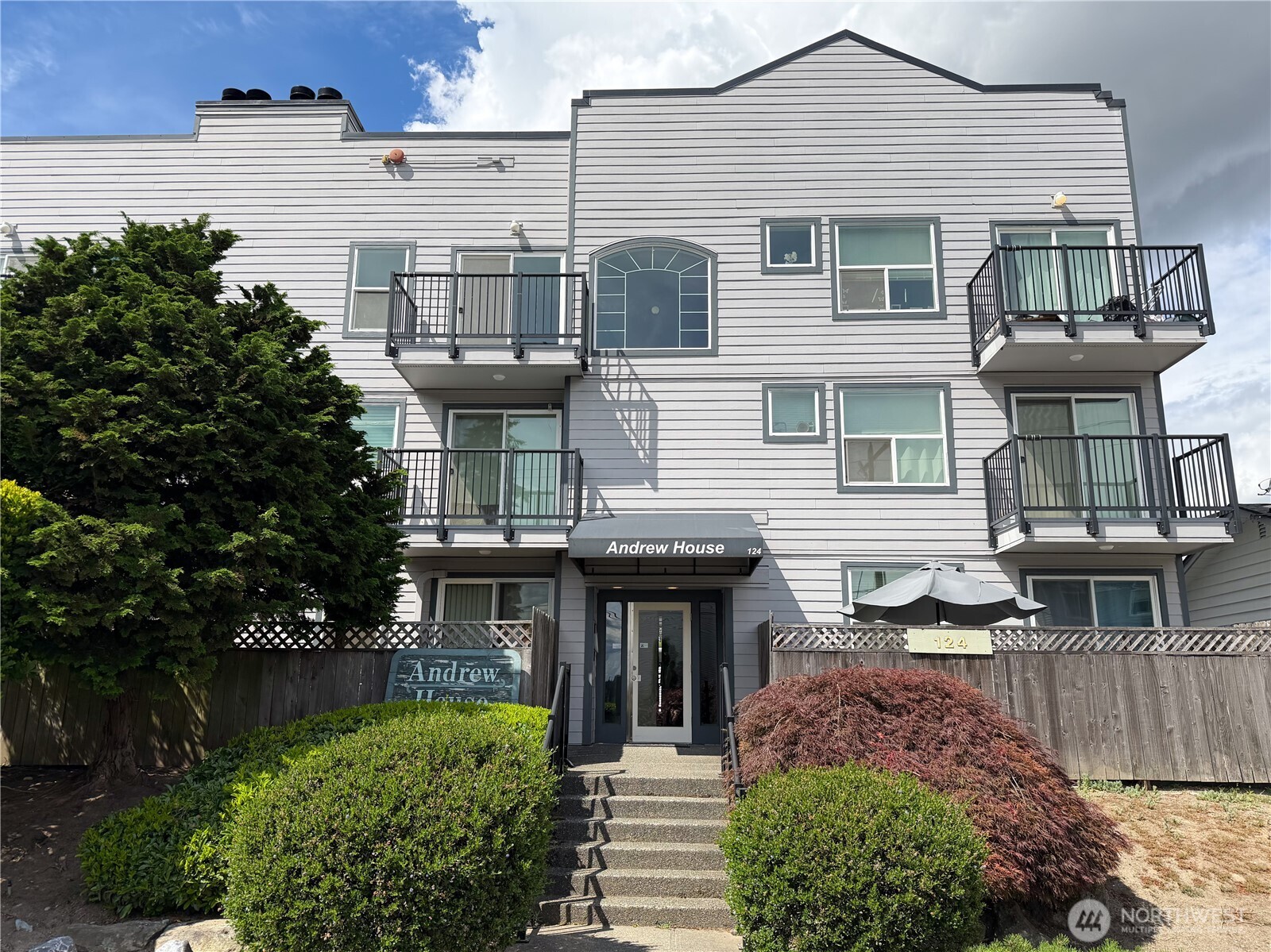 Come check out this charming top-floor, south-facing unit featuring a beautiful view of Mt. Rainier.  This home has been thoughtfully updated with new carpet, new toilet, fresh paint, and updated lighting, vinyl windows The open-concept kitchen includes a skylight and opens to a living room with a wood fireplace. For your convenience, the unit also includes an in-unit washer and dryer.    The building offers secure entry, a reserved parking spot in a controlled garage, and a large storage room. Located within walking distance of Old Town Burien, the property provides easy access to major freeways and the airport.