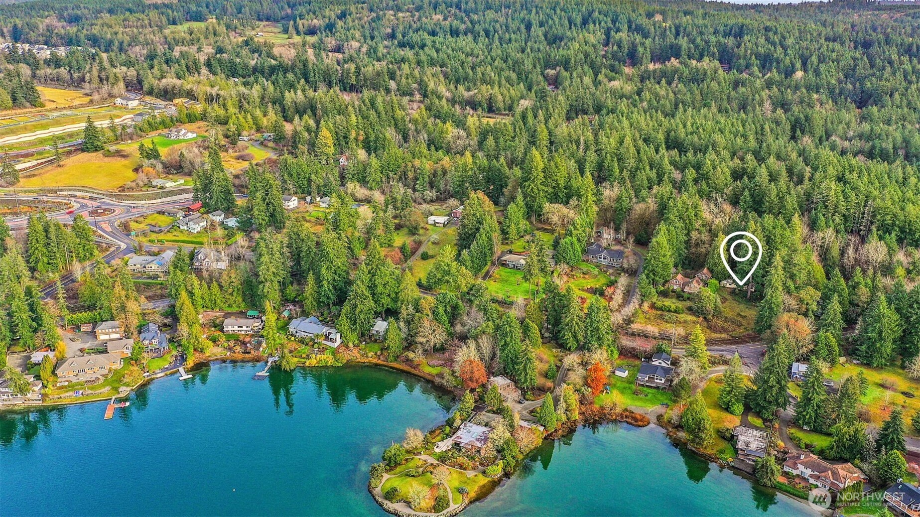 Soak in sweeping views of Liberty Bay and the Olympic Mountains from this incredible 2.8-acre parcel tucked away in one of Poulsbo’s most sought-after areas. With privacy, infrastructure, and potential already in place, including a 3-bedroom gravity septic (2010), shared well, power, and driveway, this property is ready for your vision. Whether you’re planning a custom home or exploring investment options, the existing mobile home adds bonus flexibility. Owner Financing Available. Just minutes to downtown Poulsbo and the Bainbridge ferry, this location offers both convenience and serenity. Reimagine, rebuild, or rent, your Liberty Bay dream starts here!