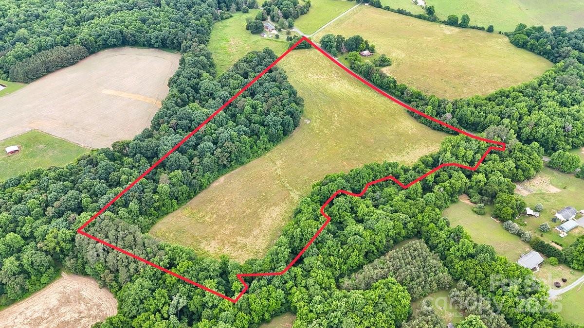 Discover the perfect blend of rural tranquility and development potential with this expansive 28.75-acre parcel lot. Zoned RA this property offers a multitude of opportunities for residential development, agriculture pursuits or a private estate. Nearby attractions include Morrow Mountain State Park just a short drive away this park offers hiking camping and views of Uwharrie mountains. Downtown Albemarle hosts cultural events, local dining and shopping centers. Baldin lake is also nearby giving the chance to enjoy boating, fishing, and water sports on this nearby recreational lake. Road access, direct frontage on Pennington Road. 
This property also offers investment potential for developers, farmers, investors or individuals looking to build a custom home or family compound.