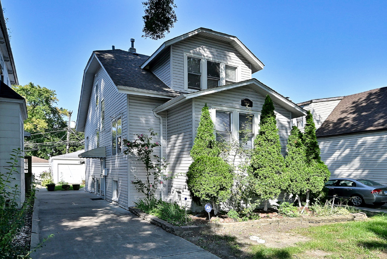 Welcome to this charming, exceptionally spacious, and beautifully updated Cicero home, where comfort, versatility, and room to grow come together! Offering 4+2 bedrooms, 3 full bathrooms, a fully finished walkout basement, and a rare 3-car garage, this home provides an incredible amount of living space and flexibility for today's lifestyle.    Step inside and you'll immediately appreciate the home's generous layout and fresh, updated feel. With four bedrooms above grade, there is plenty of space to spread out, while the two additional bedrooms in the finished basement open the door to even more possibilities. Whether you need space for guests, a home office, recreation room, workout area, hobby space, or extended living, this home gives you the flexibility to create a setup that works for you.    The fully finished walkout basement feels like a true extension of the home rather than simply additional storage space. With two bedrooms and convenient exterior access, it's perfect for buyers looking for extra usable square footage and versatility. Throughout the home, recent updates create a fresh and inviting atmosphere while still leaving plenty of opportunity for the next owner to add their own personal touches.    Outside, you'll find another feature that truly sets this property apart-a rare 3-car garage with a rear overhead party door that opens directly to the yard. Open it up during warmer months and create the perfect indoor-outdoor setup for summer barbecues, birthday parties, family gatherings, or simply relaxing in the backyard. The private driveway provides even more convenient off-street parking, making this property especially appealing for anyone needing additional vehicle or storage space.    The location adds even more to love. Situated in an established Cicero neighborhood, you'll enjoy convenient access to shopping, dining, public transportation, schools, and everyday amenities, while having a neighborhood park just down the street. Whether you're commuting, running errands, or spending an afternoon outdoors, everything you need is within easy reach.    Homes offering this combination of six total bedrooms, three full bathrooms, a finished walkout basement, generous living space, a private driveway, and a 3-car garage don't come along every day. If you've been looking for a spacious, beautifully updated home with a flexible layout and unique features you don't often find, this Cicero gem is one you won't want to miss. Come experience the space, possibilities, and charm this wonderful home has to offer. Schedule your private showing today and come see it before it's gone!