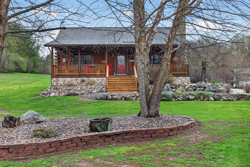 *OFFERS RECEIVED: HIGHEST & BEST DUE BY MON 4/20 @ 5PM.* Imagine coming home to a perfectly tree-lined, long driveway leading to your dreamy front porch, beautiful landscaping, heated pole barn complete with an outdoor patio bar, all on 13.75 acres!  This freshly stained log home flaunts a grand stone gas fireplace, cathedral ceilings, airy & spacious rooms, plentiful closets and all appliances. With 2 bedrooms and a full bathroom on each level, lodging or entertaining is easy.  The exterior wood-burning system option will help keep costs efficient!  Welcome home to stunning views, peace & tranquility just in time to watch the stars.