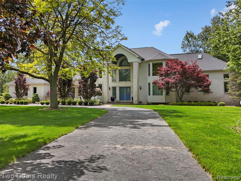Move right in and enjoy the summer in this stunning home. Nearly 9000 sf of living space! One of the lowest price per square foot on fab Heather Lake, and with 1.3 acres, this home is just waiting for you to make it yours. From the moment you enter the marble foyer you'll be amazed at the views. Newer floor to ceiling Pella windows allow the serenity of the lake to flow right into the home. Stunning architecture, sweeping curved staircases, a grand foyer, all features of this custom built home. The showpiece of the home is the fabulous wall of windows. Every room in his home was designed to enjoy a view of the Lake. All complimented by huge living spaces and soaring ceilings throughout. The First Floor Primary Suite includes a sitting area, large closet, jacuzzi tub. The light filled kitchen has a large island, newer appliances, including dual ovens, wine fridge, french door refrigerator.  Very spacious office and dedicated dining room also on main level. Moving upstairs, every bedroom on the second level is a suite with attached full bathrooms and walk in closets. An additional bonus room and large loft space allow this home to be suited to your needs. The 3,400 finished square feet in the Lower Level, again with the wall of windows, bring the outside in and you can enjoy the lake during every season. Plenty of room for entertaining, and complete with a second kitchen and dining area. Step into the sauna, or enjoy a dip in the hot tub, then relax in the electric motor lake. Vacation at home with this one of a kind property. Custom built in 1998, bring your vision to life and truly make this home your own. Direct stairway access to the garage from the lower level, great for catering staff. First floor laundry, additional hookup in lower level. Other features include roof & Pella windows (both 2015) whole house generator, Trex back deck, circular driveway, two pantries, whole house vacuum, skylights, 3 dual sided fireplaces. Furniture negotiable.