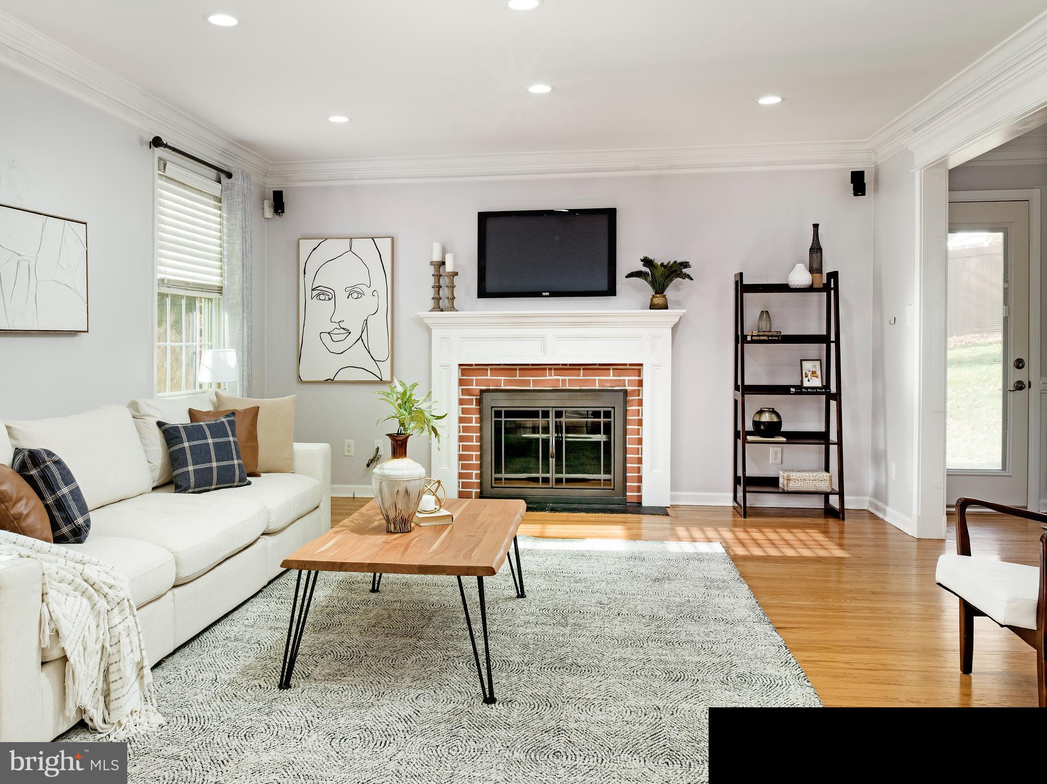 Tucked along a quiet lane in the sought-after Brookmead Farms neighborhood, this classic brick Colonial has been completely renewed with exceptional quality and care. The home combines timeless Main Line character—brick façade, mature trees, original hardwood floors—with thoughtful modern updates for today’s lifestyle.Natural light fills each room, creating a warm, comfortable energy throughout the home. The kitchen has been beautifully renovated with custom cabinetry, granite countertops, and a tile backsplash, flowing easily into a large family room with built-in shelving and a Martin Logan recessed surround-sound system—ideal for movie nights, entertaining, or quiet evenings in.The formal dining room, framed by chair rail and crown molding, opens to a spacious living room anchored by a wood-burning fireplace and classic picture window. Upstairs, two custom bathrooms by T. Masters Remodeling showcase meticulous craftsmanship—heated floors, quartz counters, Italian tile installed on a wet bed of concrete for durability, Brizo fixtures, and handcrafted Bertch cabinetry. Each space feels spa-like, designed for both beauty and long-term quality.Extensive exterior improvements include StoneCreek reclaimed brick, a 2024 Landmark 50-year roof with ventilated soffits and a 6K. gutter water-mitigation system, energy-efficient windows and doors, and an Invisible Fence for pets. A 300-sq-ft custom shed, French drain and sump pump, Generac transfer switch with sub-panel, Lutron lighting, Nest thermostat, and Google security system make the property as functional as it is elegant.The oversized lot offers room to garden, play, or simply enjoy the quiet privacy that defines this part of Wayne. Located minutes from Glenhardie Country Club, Devon Train Station, shopping, dining, and major routes, and within the award-winning Tredyffrin-Easttown School District, 481 Red Coat Lane represents the best of Brookmead Farms living—classic architecture, modern efficiency, and an unmistakable sense of home.