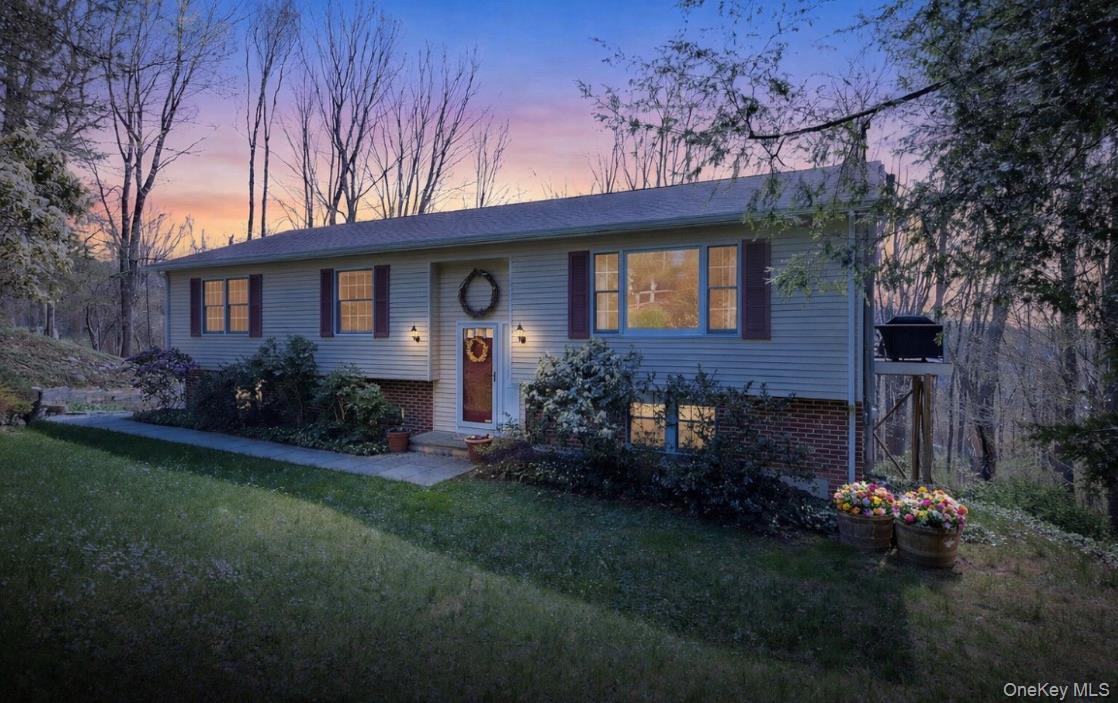 Welcome to this charming home nestled on a 1.24-acre lot on a quiet cul-de-sac in desirable Cross River, within the Town of Lewisboro and the award-winning Katonah-Lewisboro School District. This beautifully maintained residence offers three bedrooms, 2.5 baths, and flexible living space, perfect for today’s lifestyle. Gleaming hardwood floors throughout and abundant natural light enhance the inviting interior. The lower level provides an ideal hangout space for entertaining or a cozy night in. Enjoy peaceful, private backyard views from the multi-level deck, perfect for relaxing or hosting. Additional highlights include a wood-burning stove. Surrounded by mature trees and nature, yet conveniently close to local amenities, commuter access, and area parks - including Ward Pound Ridge Reservation which boasts 4000 acres and numerous scenic trails - this Cross River home blends tranquility with convenience.