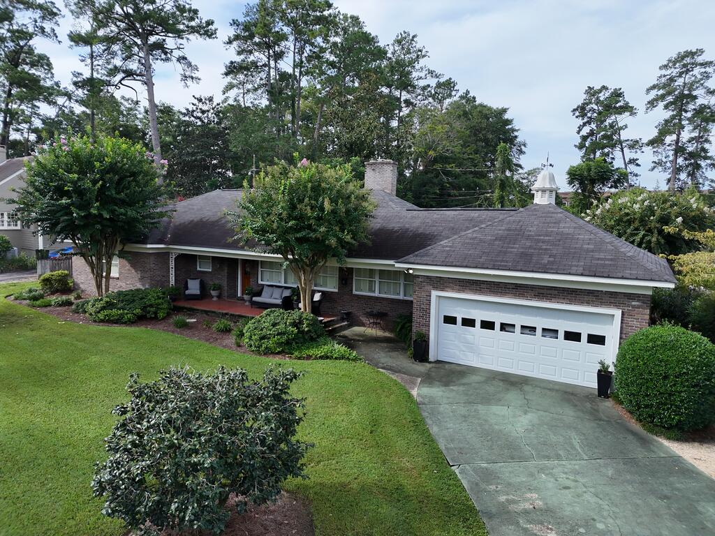 Beautiful Thomasville Home with Private Pool! Welcome to 117 Myrtle Drive, a beautifully maintained 3-bedroom, 2-bath home offering comfort, elegance, and an inviting outdoor retreat—just minutes from downtown Thomasville.  Step inside to find beautiful wood floors, plantation shutters throughout, and a spacious sunroom that brings the outdoors in. The kitchen features quartz countertops, while the tile baths add a touch of timeless style. The living area is warm and inviting with a fireplace featuring gas logs, perfect for cozy evenings at home.  Outside is where this property truly shines! Enjoy your own screened-in, enclosed in-ground pool, surrounded by lush grass and beautifully established flowerbeds—a wonderful setting for relaxing, entertaining, or enjoying those long Southern afternoons. 3 Bedrooms  2 Baths Screened-In Inground Pool Beautiful Landscaping & Flowerbeds Sunroom  Plantation Shutters Throughout  Wood Floors  Quartz Countertops  Fireplace with Gas Logs Conveniently Located Near Downtown Thomasville  117 Myrtle Drive is a special home that combines classic charm, thoughtful updates, and an exceptional outdoor lifestyle—all in a wonderful location.  Come see why this one feels like home! Click here for virtual tour: https://my.matterport.com/show/?m=9JqymDWoty7&mls=1