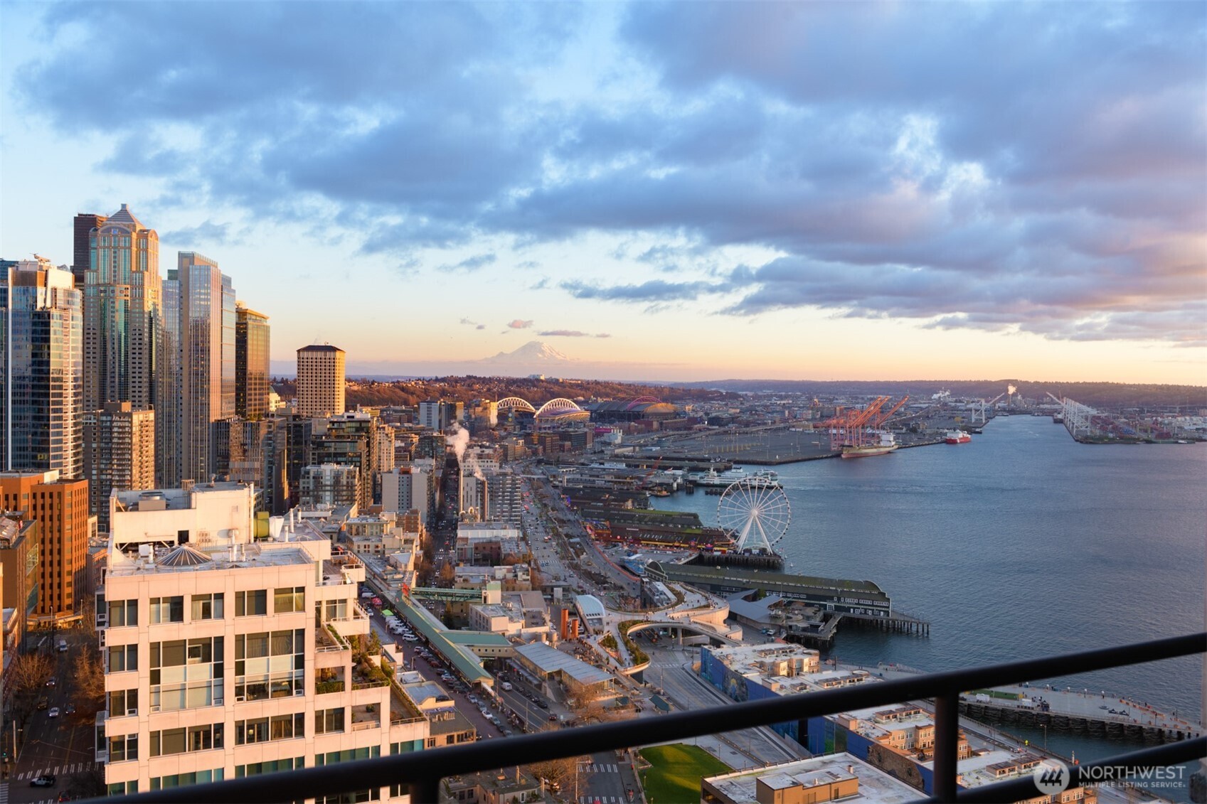 Offered for the first time, this bespoke residence is considered “One of One”. Offering jaw-dropping views & a masterful renovation by Seattle-based and internationally renowned interior designer Terry Hunziker. A brilliant collaboration between owner & designer created an arrestingly beautiful yet understated interior. Hunziker’s signature aesthetic of timeless design & highly detailed interiors is magnificently showcased in this iconic Seattle Penthouse. Custom window seats, 2 balconies, an extensive use of artisan & natural materials, 11’ ceilings and top-of-the-world views provide the perfect backdrop to this unforgettable home.  Tax SF 2,890, window seating may increase SF to as much as 3,190.