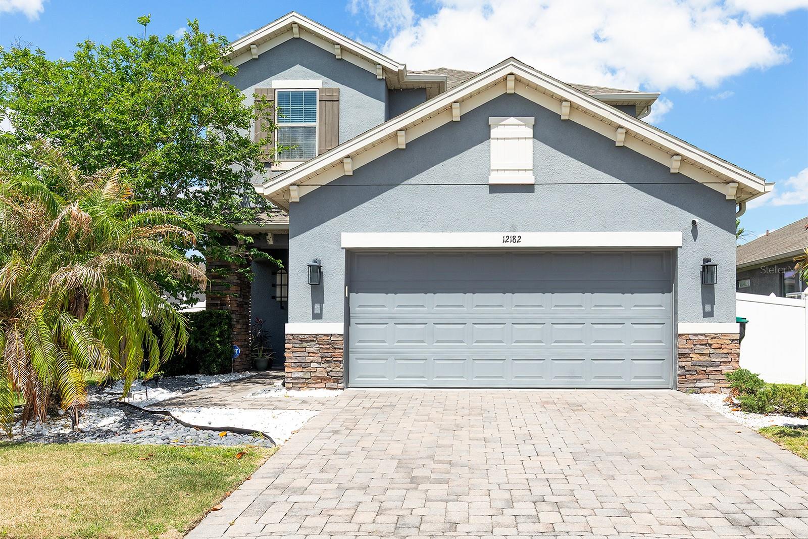 Modern Design, Impressive Upgrades, and a Prime Location—this great home in Woodland Park offers the perfect blend of style and convenience, situated between Lake Nona and Hunters Creek, just 3.5 miles from Orlando International Airport.Boasting 4 spacious bedrooms, 3.5 beautifully appointed bathrooms, and a dedicated office on the second floor, this home also includes a 2-car garage. With soaring 12-foot ceilings and an abundance of natural light, the open-concept layout seamlessly connects the front entry to the fully fenced backyard, featuring extended pavers—ideal for entertaining. The upgraded kitchen is a chef’s dream, showcasing 42” espresso cabinetry and sleek stainless steel appliances. A second upstairs primary suite with a private bath adds even more flexibility for multi-generational living or guest accommodations.Located just minutes from Downtown Orlando, Lake Nona, SunRail, shopping, dining, and top attractions like Disney and Universal, this home offers the ultimate in convenience.Don’t miss out—schedule your showing today before this home is gone!