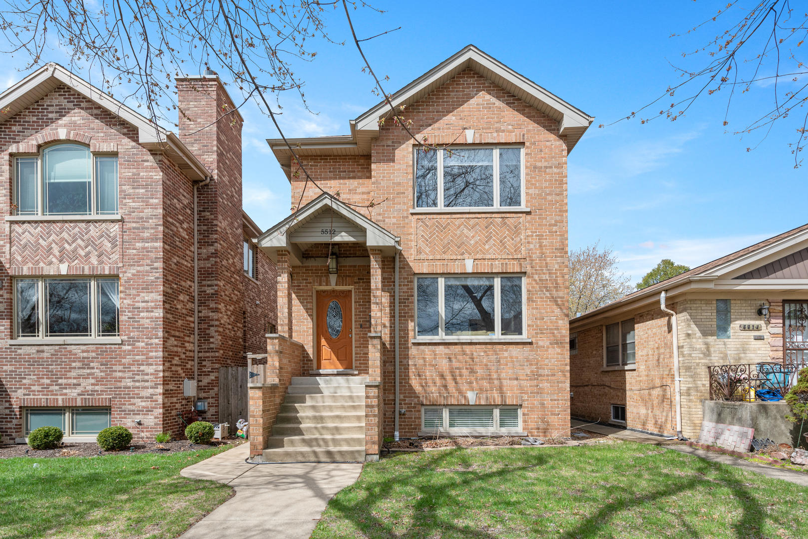 Welcome to this meticulously maintained and thoughtfully upgraded brick home offering 5 bedrooms and 3.5 bathrooms, just steps from Norwood Park. Designed with the perfect open layout for everyday living and entertaining, the main floor features a grand fireplace in the living room and a chef's kitchen with granite countertops, stainless steel appliances, an oversized eat-in island, brand new butler's pantry. The kitchen flows effortlessly into the dining room and family room and opens to a deck-ideal for hosting.  Upstairs, the luxurious primary suite boasts cathedral ceilings, a private terrace, walk-in closet (newly added!), and a spa-like bathroom with double vanity, soaking tub, separate shower, and new built-in storage. All four bedrooms feature a professionally built-out closet organizer system for maximum functionality. The fully finished walk-out basement is an impressive bonus, now featuring a newly built office/bedroom with insulated walls and raised floors, tall 10-foot ceilings, a large rec room, 2 bedroom/Office Space, full bathroom, new waterproof LVP flooring, and an oversized laundry room with a brand new washer and dryer (2023). Additional basement storage under the stairs adds even more versatility.  Other recent upgrades include a new high-capacity instant water heater, EV charger installed in the 2.5-car garage, and dual-zone HVAC, overhead sewers with sump and backup pump. Enjoy outdoor relaxation on the brick paver patio. Unbeatable location close to the Blue Line, Kennedy Expressway, O'Hare, Norwood Park, Taft High School, Mariano's, Starbucks, and within highly rated Garvy Elementary boundaries. A truly turn-key, solid home with smart enhancements throughout-move right in and enjoy!