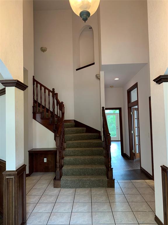 This gorgeous four bedroom, three bath with a study and a game room. Home offers a beautiful escape from Norman's fast paced City life but is still minutes away from shopping! With this home you will be able to enjoy over two acres of private property, a 12 person in-ground storm shelter and a private dock on the community pond.