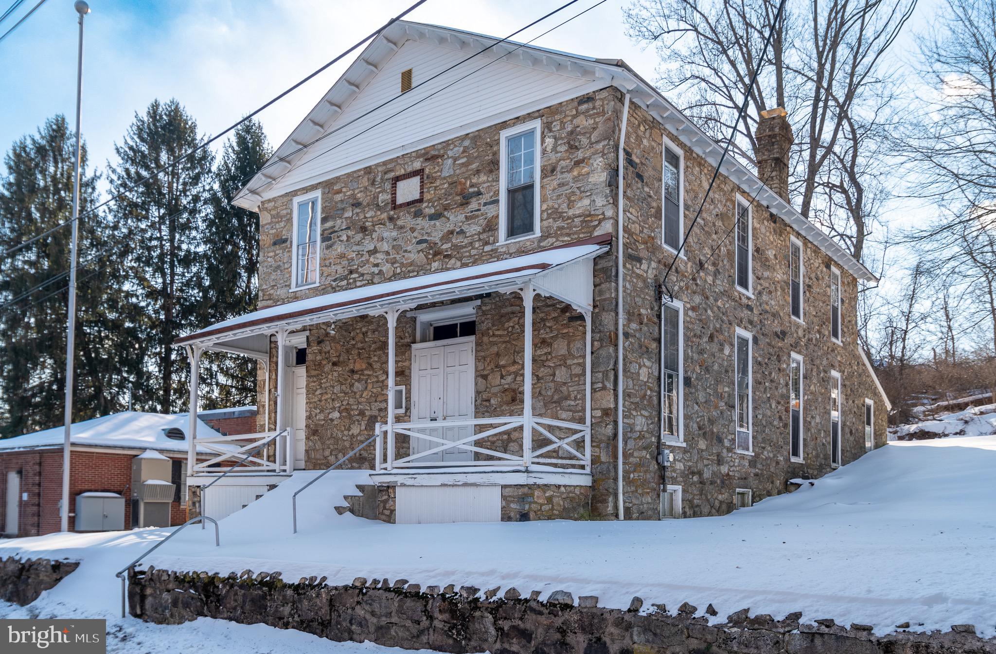 Don’t miss this unique renovation prospect in the heart of Chester Springs, only 2 minutes from historic Yellow Springs! Built in 1902, the historic Patriotic Sons of America building remained under single ownership until 2011. With high ceilings and expansive open rooms, the property is well suited for an inspiring live/work environment. Each floor features a large open space with hardwood floors and abundant natural light, along with plumbing for two bathrooms; toilets and sinks are in place, though the bathrooms remain unenclosed, allowing flexibility for future layout and design. The potential for living, creating, and reimagining the space is substantial, and while work remains to be done, this is a project where the process itself will be part of the reward!