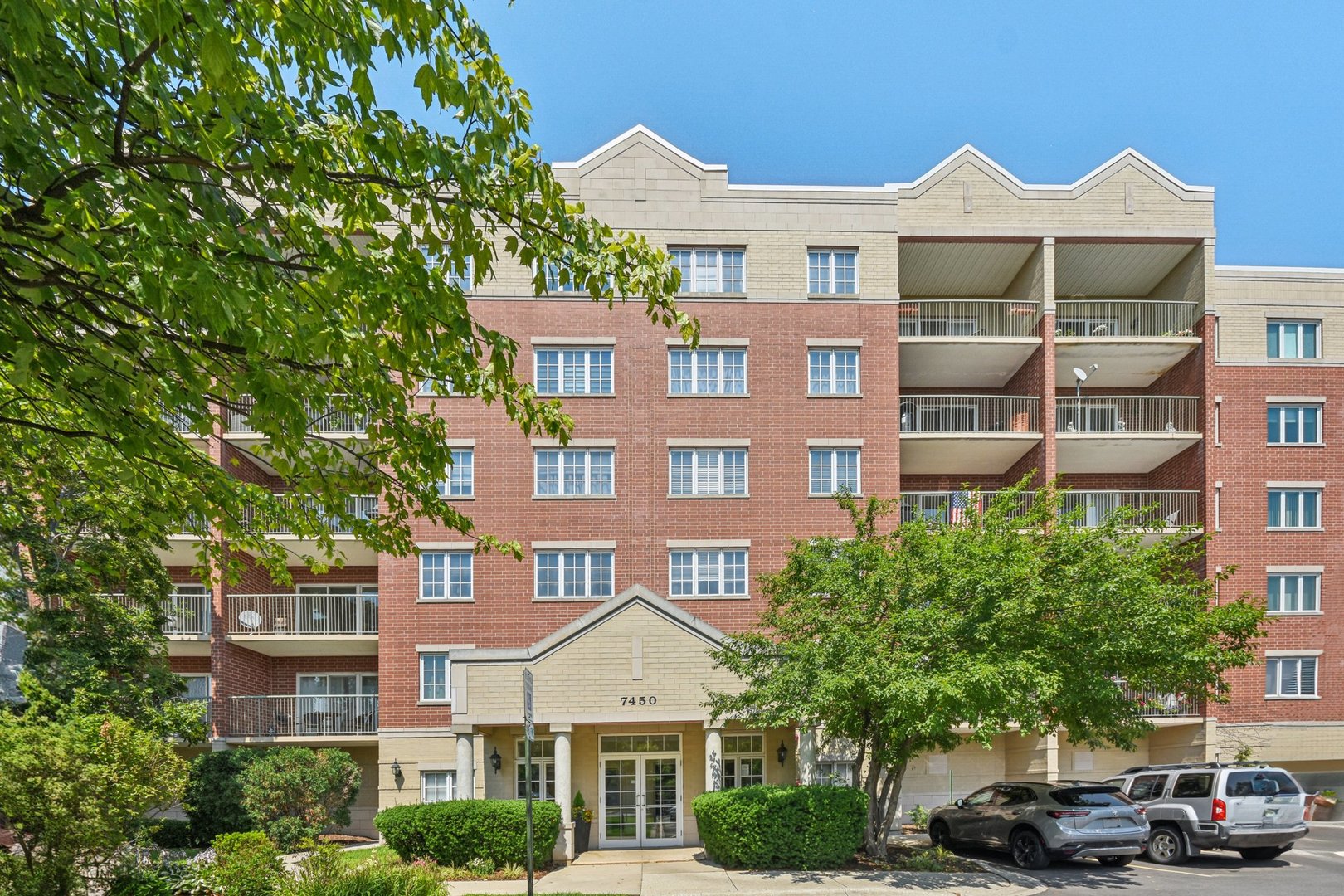 This perfectly located 2 bed 2 full bathroom condo one you've been waiting for! Enjoy easy living in a beautifully maintained condo building boasting a tucked-away feel, ample exterior guest parking, 1 assigned garage space, and a bonus storage space! Step inside the shared foyer and note the security doors, convenient doorbell/cell phone system, and well-maintained interior! Take an easy elevator up to this corner-unit condo and note the peaceful and sunny location! Enjoy wood flooring, neutral paint, & updated appliances! This spacious floorplan offers an oversized primary bedroom with plenty of room for a king bed, spacious closet space, and private full bathroom! Primary bathroom offers a jetted tub, separate shower, & dual sink vanity! Guests will enjoy the private location of their own bedroom and bathroom on the opposite side of the property! Host events with ease in the formal dining room & adjacent galley-style kitchen offering upgraded stainless steel appliances and room for a second table! You will love the spacious living room boasting sunny views & a spacious balcony! Convenient in-unit laundry & tranquil location! Located near public trans, Oakton College, shopping, restaurants, entertainment, & parks! Association covers gas, heat, water, common area cleaning, snow removal, & lawn maintenance! Easy low-maintenance living, beautiful brick building, & quick closing is possible!