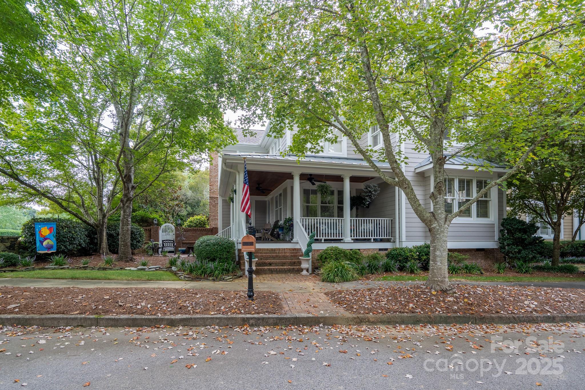 This desirable end-unit home provides all you need for making special memories at the lake! This is an opportunity to enjoy maintenance-free lock-&-leave living, since the HOA takes care of yard work & mows the lawn. Step inside from the charming front porch to the 2-story light-filled Great Room off the kitchen & its adjoining breakfast nook. At the top of the stairs, there is nice flex space in addition to the upstairs office/bonus room. The bedrooms are also upstairs & feature ensuite baths. No living space is left to be desired, thanks to the inclusion of a formal dining room for entertaining as well as a garage & full laundry room. Guests can comfortably stay in the beautiful bonus room over the garage, which includes a kitchenette. The backyard is fully fenced & mature landscaping offers privacy. Join the Old North State Club to be within steps of the driving range & championship golf course, pools, dining, walking trails, fitness center, courts & more.