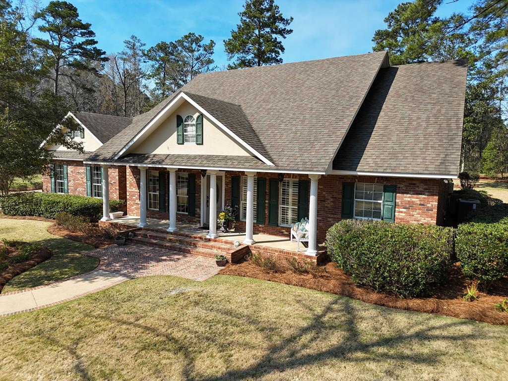 409 Habersham Road in Thomasville, Georgia, is a gorgeous all-brick custom home on a double lot. With four bedrooms, three full and two half baths, it offers a master suite with a sitting area, jacuzzi tub, and zero-entry tile shower. The private junior master has a spacious bathroom with its own zero-entry shower. Entertain in the fireside living room, a den with a bar and fireplace, and a formal dining room. The kitchen shines with stainless steel appliances and granite countertops. Outdoors, a brick and stamped concrete patio features two covered areas, a pergola, and a brick fire pit. The professionally landscaped yard includes lighting and irrigation, and a detached oversized 30x50 garage is ready for your motor coach, RV, boat, car collection or other toys. There is also a regular two-car garage in the home. Luxury, space, and outdoor charm all in one perfect package. Click here for a virtual tour: https://my.matterport.com/show/?m=jGSJmL1BaLs&mls=1