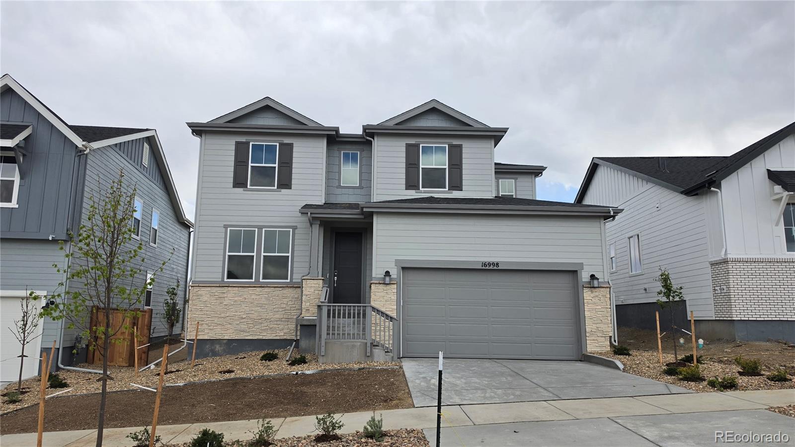 What's Special: 3-Car Tandem Garage | Larger Backyard | Close to Park | Close to Trails | Dedicated Study | Covered Patio. New Construction - Ready Now! Built by America's Most Trusted Home Builder. Welcome to the Silverthorne at 16998 W 92nd Drive in Trailstone City Collection! This stunning two-story home offers the perfect blend of space and comfort for growing households. The open-concept kitchen, dining area, and soaring great room with a cozy fireplace create an inviting space for connection and everyday living. Culinary enthusiasts will love the well-equipped kitchen featuring an eat-in island and a spacious walk-in pantry, while the sunny morning room is ideal for enjoying Colorado’s beautiful light. Thoughtful details like a convenient garage entry and ample storage make life easier. Upstairs, retreat to the elegant primary suite with double-door entry, a luxurious 4-piece bath, and a generous walk-in closet. Three additional bedrooms and a functional laundry room complete the upper level. The included basement adds flexibility for storage, a home gym, or can be finished for an extra bedroom, full bath, and recreation space. Discover Trailstone, a new home community on the edge of the Rocky Mountains in Arvada, CO. Just off Candelas Parkway and only 15 miles from Boulder, find room to roam in stunning single-family homes with spacious backyards in Arvada. You'll love the incredible views of Downtown Denver, the Rocky Mountains and Standley Lake. With incredible planned amenities including an outdoor pool and pickleball courts, every day is an opportunity to explore a new path at Trailstone. Additional Highlights include: freestanding tub at primary bath, covered outdoor living, study and white cabinets. Photos are for representative purposes only. MLS#1768299