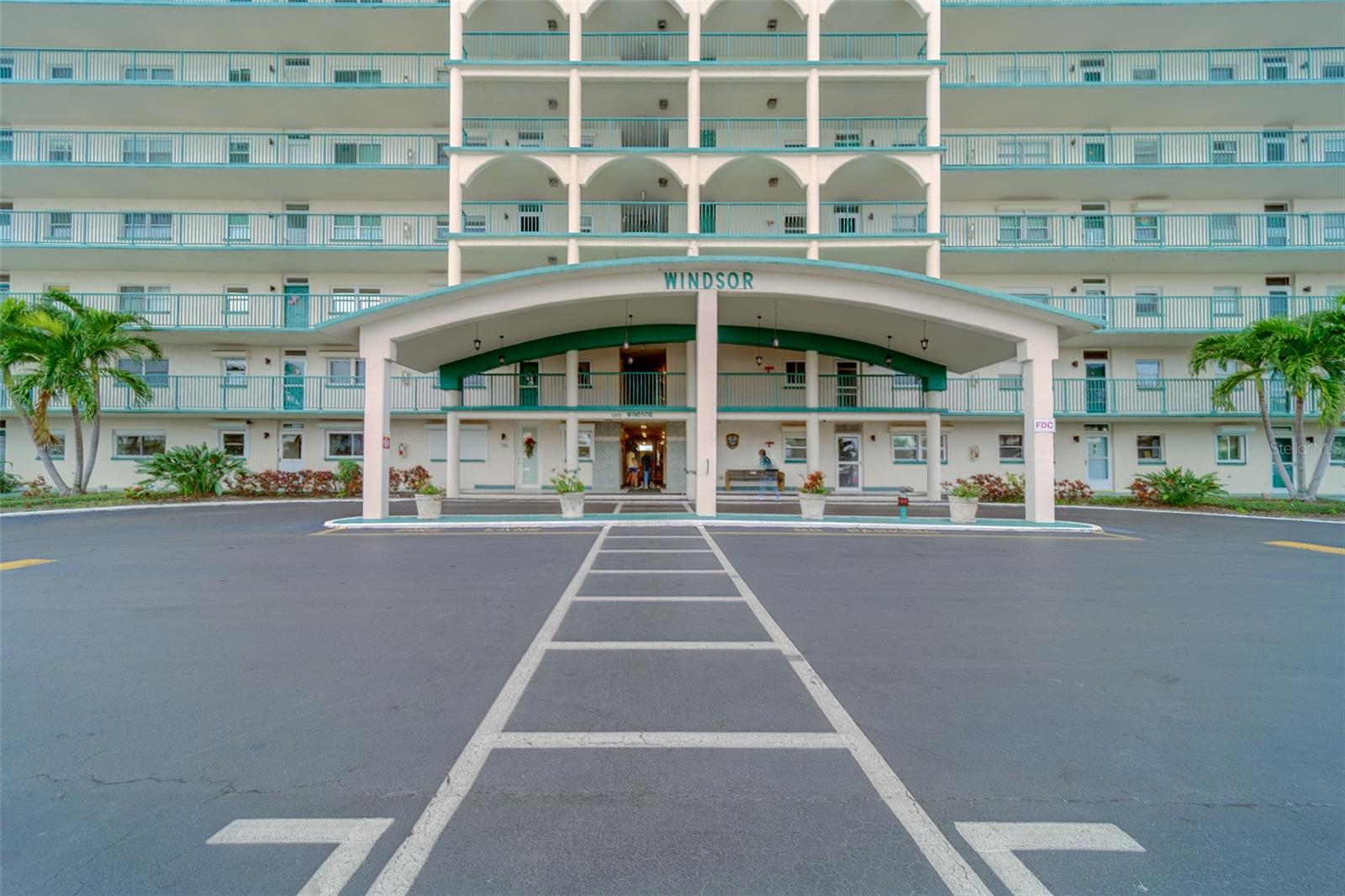 Welcome to waterfront living at its finest in the prestigious Windsor Building at Town Shores of Gulfport, a highly sought-after 55+ community! This beautifully positioned 6th-floor, 2-bedroom, 2-bath condo offers breathtaking views of Boca Ciega Bay, where dolphins often play just beyond your windows.Inside, you’ll find a desirable split-bedroom floor plan and an open, light-filled layout that creates a seamless flow between the spacious living, dining, and gathering areas—all overlooking the water. The kitchen features a gas range, perfect for quick, efficient cooking, and is ideally situated for entertaining or everyday living.This unit includes a covered carport to keep your vehicle shaded, along with ample guest parking for visitors. The Windsor Building is known for its panoramic views and serene waterfront setting, making every day feel like a retreat.Town Shores offers an incredible lifestyle with four pools, a clubhouse with card rooms, billiards, puzzle room, library, kitchen area, and fitness center, plus pickleball and tennis courts, bocce ball, shuffleboard, fishing spots, and more. One of the community’s greatest perks is its short walk to charming downtown Gulfport, where you’ll enjoy unique shops, top-rated restaurants, art, and endless activities.With a low monthly association fee that covers so much, this is truly a value you don’t want to miss. Don’t delay—schedule your private showing today and start enjoying the Town Shores lifestyle! ????