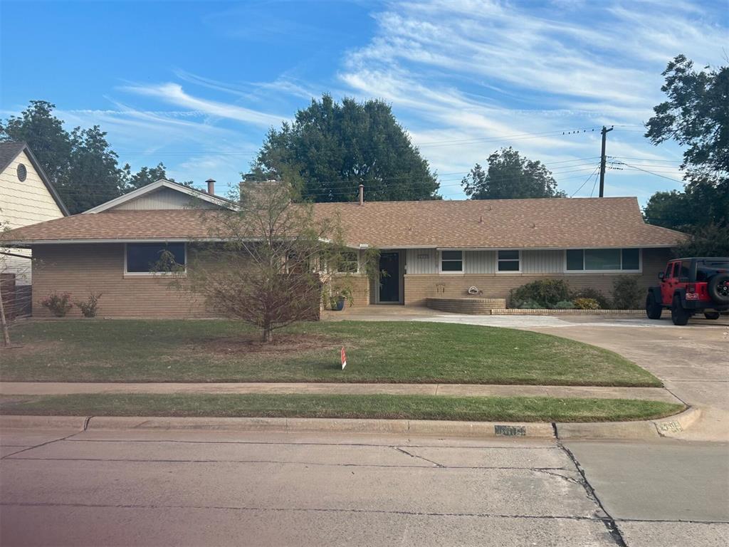 The remodeled three-bedroom home custom designed for accessibility with extra-wide hallways and 36" door, features a true separate office with its own entrance, potentially serving as a fourth bedroom. Key updates include a new sewer line (2024), electrical panel, and gas line (2022). The bathrooms have been taken to the studs and completely renovated with high-end finishes.  The kitchen boasts new cabinet doors and drawers, granite countertops, and modern GE appliances including convection oven with wifi, Profile microwave, GE quiet dishwasher and Kitchenaid smooth surface cooktop.  The home has all newer windows and expansive newer sliding 12' back door (all with custom blinds) leading to a patio with a pergola, and includes a storage building, chicken coop and recently replaced wood fence (2023).