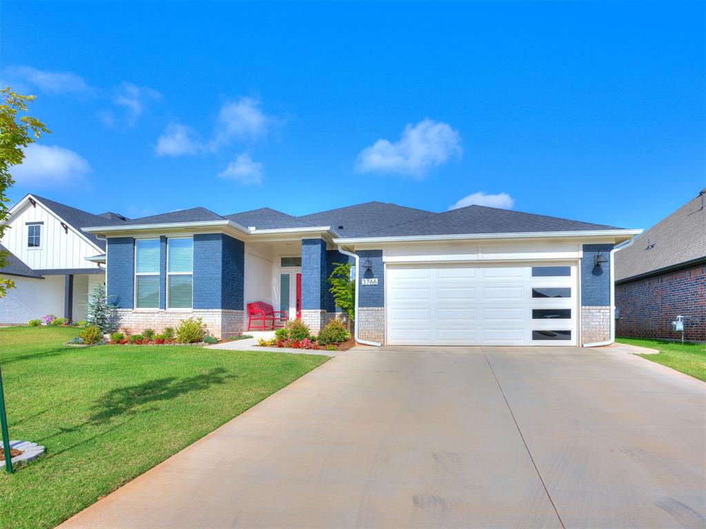 This gorgeous 3 bed, 2 bath home blends modern design with thoughtful functionality in every room. Built in 2024, it offers the feel of a brand new home with upgrades already in place — including no carpet, with engineered wood and ceramic tile throughout.   Step inside to a spacious living room featuring a vaulted ceiling with striking wood beams and a cozy gas fireplace. The living area flows seamlessly into a showstopper kitchen with blue custom woodwork, quartz countertops, a farmhouse sink, built in appliances, and a walk in pantry. An oversized breakfast area provides plenty of space for everyday dining. The primary suite is a retreat of its own, offering a soaker tub, dual vanities with quartz countertops, and a walk in closet. Both secondary bedrooms include oversized closets, giving everyone the storage they need. A utility room with adjacent mud bench sits conveniently off the garage entry, and the home is equipped with a tankless water heater for endless hot water. An in ground storm shelter adds peace of mind during Oklahoma weather. Outside, enjoy a huge backyard that backs up to a lush greenbelt for privacy and tranquility. The yard is fully fenced, tastefully landscaped, and includes a brand new Tuff Shed outbuilding for extra storage or workspace. Located just minutes from I 35, 5 miles from OU, and 11 miles to Tinker Air Force Base, this home offers unbeatable convenience while still providing a quiet, scenic setting. Move in ready, beautifully finished, and perfectly located — this one truly has it all.