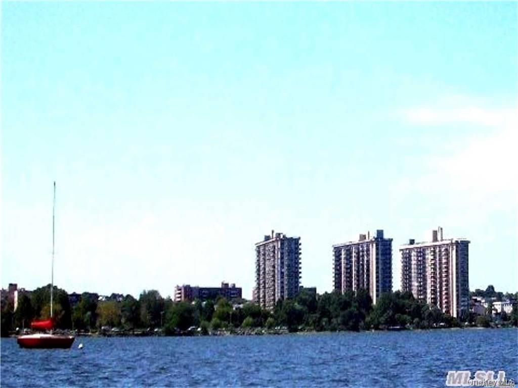 Luxury High Rise 1 Br, 1 Bath Co-Op At Towers Of Water's Edge. From Your Terrace You Have a Lovely Water View. All Utilities Included In Maintenance. Monthly Outlay of $1,197.86 Includes Gas,Electric, Real Estate Taxes, Central A/C, Heat + Assessments. Amenities 24 Hour Doorman, 24 Hour Security, Shopping Arcade (Deli, Beauty Salon, Dry Cleaners) Pool, Gym, 5 Tennis/Pickle Ball Courts. Close To All Shopping & Transportation. Indoor Garage parking Avail $190 Monthly, Special Spectrum pkg available Cable +Internet $70 per month.  Priced to Renovate , Motivated seller especially for a cash buyer.