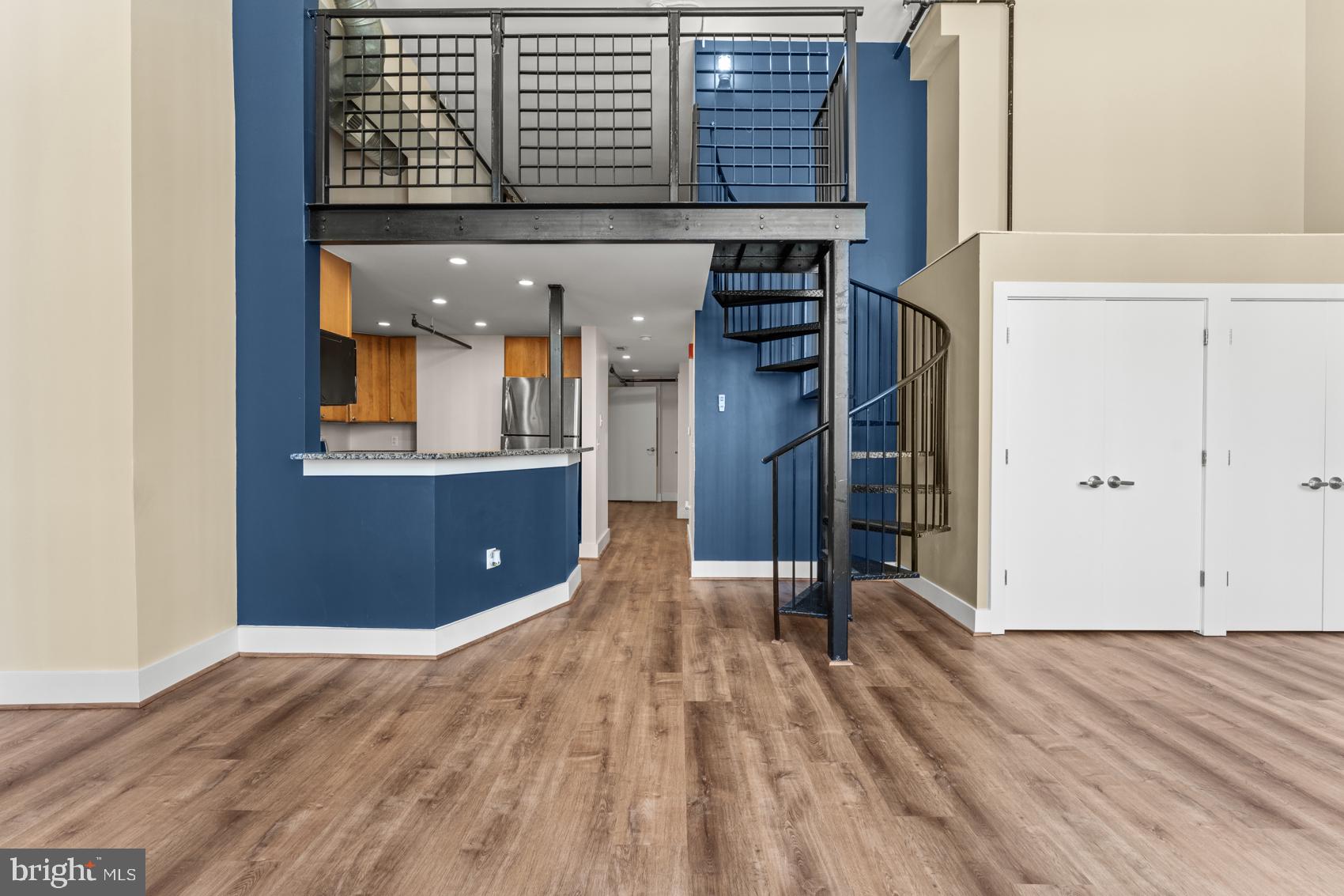 Modern Condo to Live In or Invest In. Discover living at its best in downtown Baltimore’s Rombro Lofts - Elevator Building with Secure Entry. This stylish condominium offers the perfect blend of historic charm and modern comfort all in a prime downtown location. Short distance to the University of Maryland Medical Center, UMD Law, Nursing, and Dental Schools, or enjoy easy access to the Inner Harbor, Camden Yards, M&T Bank Stadium, and the city’s top restaurants and attractions. Featuring 16-foot ceilings, oversized windows, luxury vinyl plank flooring, stainless steel appliances, granite countertops, and custom cabinetry, this open-concept loft is designed for today’s lifestyle. The spacious, newly renovated bathroom adds a touch of luxury, while the industrial steel accents and abundant natural light create a true loft feel. Parking available in the adjacent garage for an additional fee. Just steps from the Light RailLink. This is downtown living made easy!