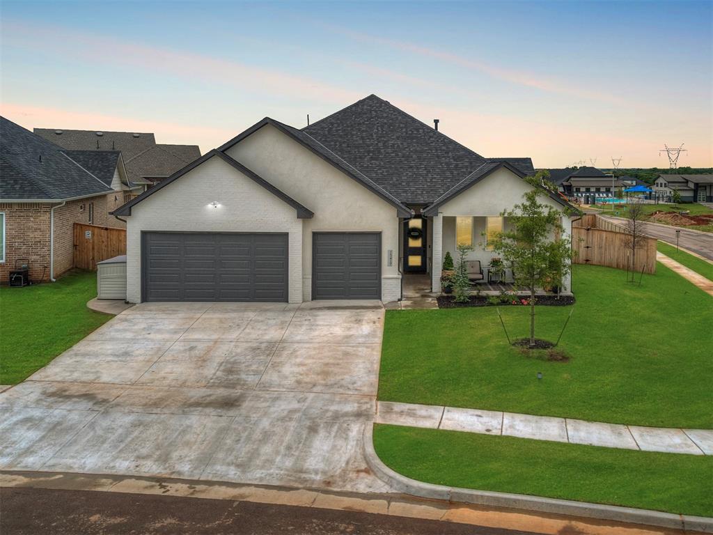 Get ready to fall in love with this exceptional home in Twin Silos! Thoughtfully designed with modern elegance, this home offers the perfect blend of style, comfort, and functionality. Enter into to a bright and airy living space, where a vaulted ceiling and gas fireplace create a striking focal point. Gorgeous tile flooring flows throughout, setting the stage for a home that’s as sophisticated as it is inviting. The kitchen is built for both everyday living and entertaining, featuring sleek cabinetry, under-cabinet lighting, a gas cooktop, and a spacious layout that makes cooking a joy. Whether hosting a dinner party or enjoying a quiet meal, this space is as practical as it is beautiful. Tucked away for privacy, the primary suite is a true retreat. A stylish shiplap accent wall adds charm, while barn doors lead to a spa-like bathroom complete with a freestanding tub, walk-in shower, dual vanities, and a closet that conveniently connects to the utility room. A separate hallway leads to the dedicated study and two additional bedrooms, offering the perfect layout for work, relaxation, and guests. Outside, the extended covered patio invites you to enjoy the outdoors year-round. Situated on a premium corner lot, the fully fenced yard—with double gates—offers both space and privacy. Additional Features: Built-in mud bench for extra storage, Zoned sprinkler system to keep your yard lush, Security system for peace of mind, 3-car garage with durable poly flooring. Plus, you’ll have access to fantastic community amenities, including a pool, clubhouse, playground, and basketball court. This home delivers on everything—luxury, space, and thoughtful details at every turn. Don’t wait—schedule your private tour today and experience it for yourself!