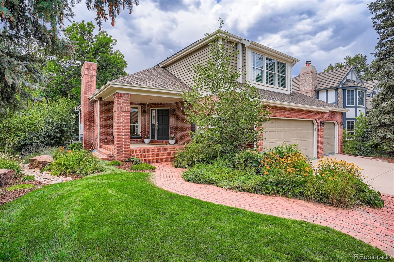 Welcome to a beautiful home set on a prime oversized lot in the highly sought after Homestead in the Willows neighborhood.  Step inside to discover a grand foyer with vaulted ceilings and elegant hardwood floors.  The main level features a dining room, breakfast nook and family room-all enhanced by large west-facing windows.  Near the bright, functional kitchen with white shaker cabinetry and high-end appliances, is a wet bar for effortless entertaining.  A dedicated home office and a spacious laundry room complete the main floor.  Adjacent to the laundry room is the three-car garage with epoxy flooring and an EV charger.  Upstairs you’ll find four thoughtfully designed bedrooms with new carpet.  The primary suite includes a spa-inspired bath with steam shower, soaking tub, dual vanities and a large walk-in closet.  The second bedroom has its own en-suite bathroom, while a Jack and Jill bath connects the two remaining rooms.  The newly remodeled walk-out basement features a generous living room with cozy fireplace, a convenient kitchenette, a modernized full bath, exercise room, bonus room, abundant storage and a mechanical room housing two water heaters.  In the backyard, towering trees provide natural privacy and cool shade for the primary suite balcony, covered deck and patio.  Unlatch the back gate to explore the serene 150-acre Willow Springs Open Space area!  With convenient access to three pools, eight tennis courts, parks, trails and top-rated schools, this new year may be the perfect time to make this home yours!