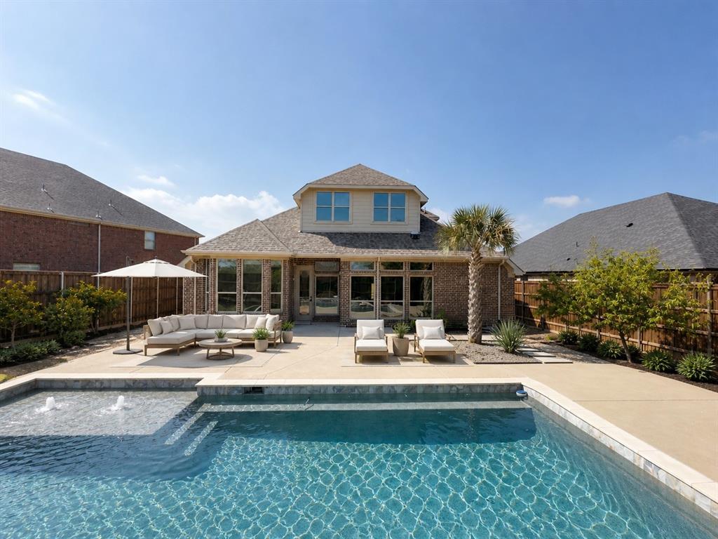 Exquisitely updated custom home in a gated community, ideally located across from open green space and near a golf course and scenic biking trails.Filled with natural light, the main living areas feature clean lines and seamless flow, opening to expansive backyard views and a true indoor-outdoor living experience. Enjoy a private resort-style backyard with a pool, putting green, and extended patio—perfect for both relaxing and entertaining. The primary suite offers a serene retreat with a beautifully updated, spa-inspired bath. Recent upgrades include fresh interior paint, refinished hardwood floors, new carpet, updated designer hardware, a redesigned staircase, and renovated bathrooms. An exceptional opportunity to own a truly elevated living experience.