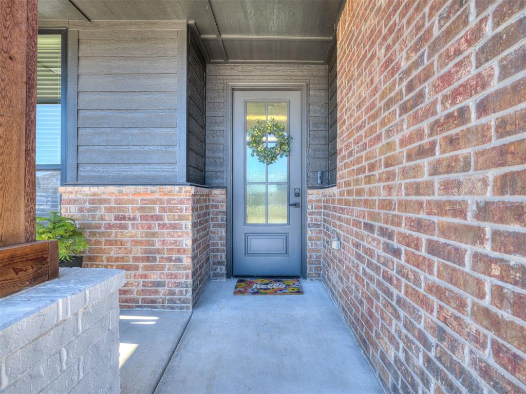 This home is fully upgraded, completely finished, and move-in ready, offering features most new builds don’t include without additional cost or months of waiting. Enjoy full fencing, full-home gutters, a storm shelter, blinds throughout, epoxy garage floors, landscaping and keypad entry on both garage doors already installed. The covered back patio is entertainment-ready with a gas line for your grill and TV hookup, making game days (Boomer!) effortless. Even attic storage is maximized for seasonal organization. Shops are allowed. Inside, the attention to detail continues. Wood-look tile flooring flows through the main living areas, offering durability and warmth that stands up to real life. The open-concept design centers around an oversized kitchen island perfect for hosting, meal prep, or everyday living, and opens to a generously sized dining space that truly fits a full table, no squeezing required. Storage and function were clearly prioritized. Abundant built-ins include custom cabinetry, shelving, an oversized mud bench with storage and a custom cushion, upgraded upper cabinet doors, and a dedicated built-in office/workspace that adds flexibility for working from home or managing daily life. The primary suite offers a private retreat with double sinks, a soaking tub, a walk-in shower, and a spacious walk-in closet that conveniently connects directly to the laundry room. Upstairs provides exceptional versatility with a private bedroom, full bath, and secondary living or bonus space- ideal for guests, teens, or a media room. Located in the highly desirable Newcastle School District, just minutes from I-35 and Norman, this home combines a peaceful setting with easy access. Clean. Upgraded. Finished. No punch list. No construction zone. No waiting on builder timelines. This isn’t just new, it’s better than new.