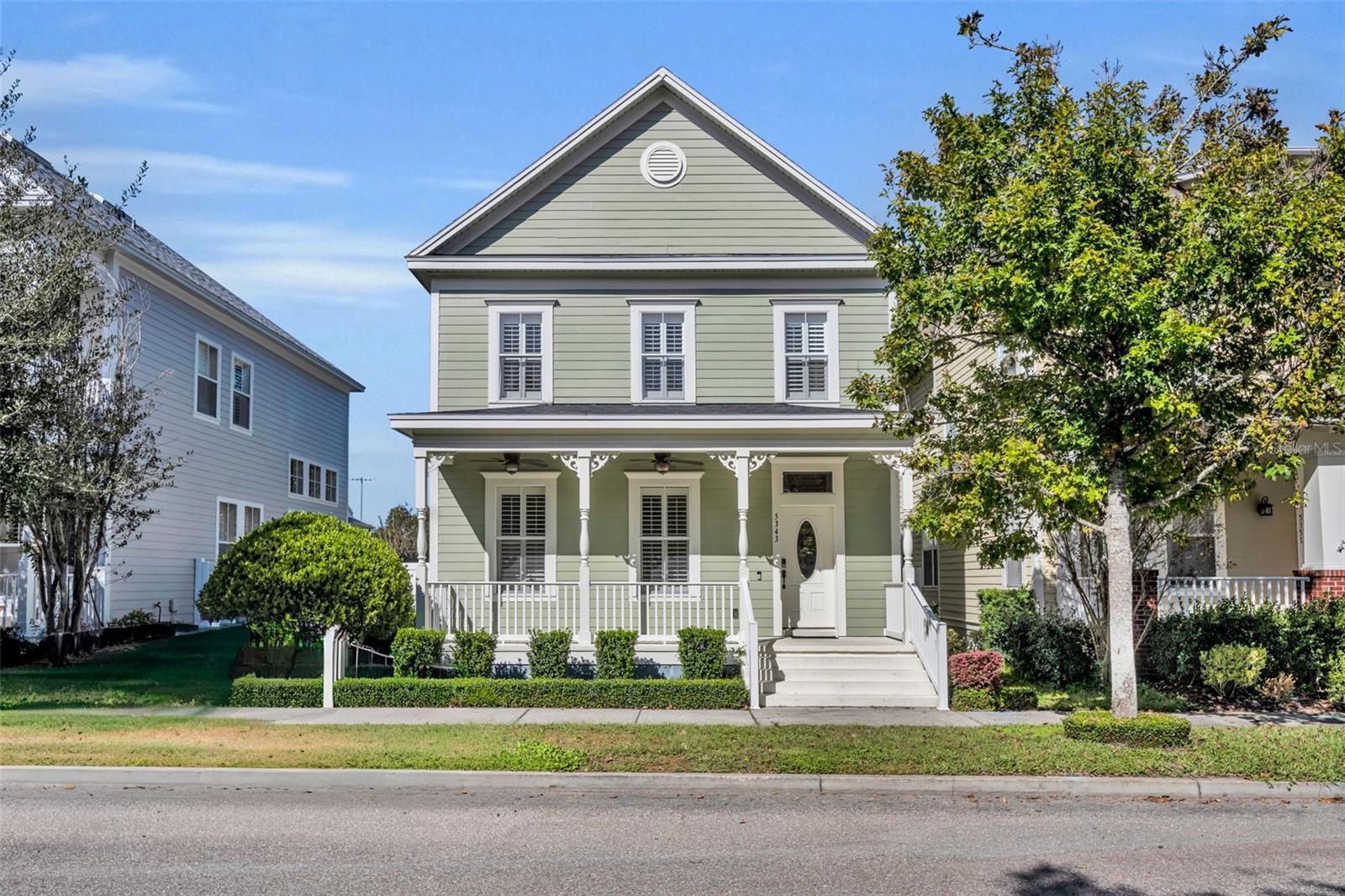 Welcome to 5343 Brady Lane — a beautifully updated David Weekley home in the heart of Baldwin Park, offering charm, privacy, and a picture-perfect front porch overlooking a peaceful park with no homes directly in front.

This 3-bedroom, 2.5-bath home spans 1,838 sq ft and features a spacious, light-filled layout with thoughtful upgrades throughout. The inviting front porch is ideal for rocking chairs or a swing, setting the tone for the warmth that continues inside.

The first floor boasts engineered hardwood flooring, plantation shutters, a formal dining room, and an open-concept living area with built-in surround sound. The newly renovated kitchen is a standout, featuring marble-like quartzite countertops, solid wood cabinets, new Samsung Bespoke appliances, a pantry, and a bar-height counter with seating for four. A convenient half bath completes the first floor.

Upstairs, the laundry room comes equipped with a brand-new washer and dryer. The spacious primary suite includes a custom built-in closet system, an additional walk-in closet, and a beautifully renovated ensuite bath with double vanities. Two additional bedrooms share an updated hall bath with a new vanity, toilet, and LED mirror.

The backyard is a private retreat—fully fenced, low-maintenance, and beautifully designed with pavers and a grassy area perfect for pets. No rear neighbors add to the sense of privacy. A two-car garage with built-in shelving provides excellent storage.

Major updates include: Roof (2023) and A/C (September 2025 installation).

Located in one of Orlando’s most sought-after neighborhoods with top-rated schools, community pools, parks, shops, and dining—this Baldwin Park home is truly move-in ready and offers the best of both comfort and convenience.