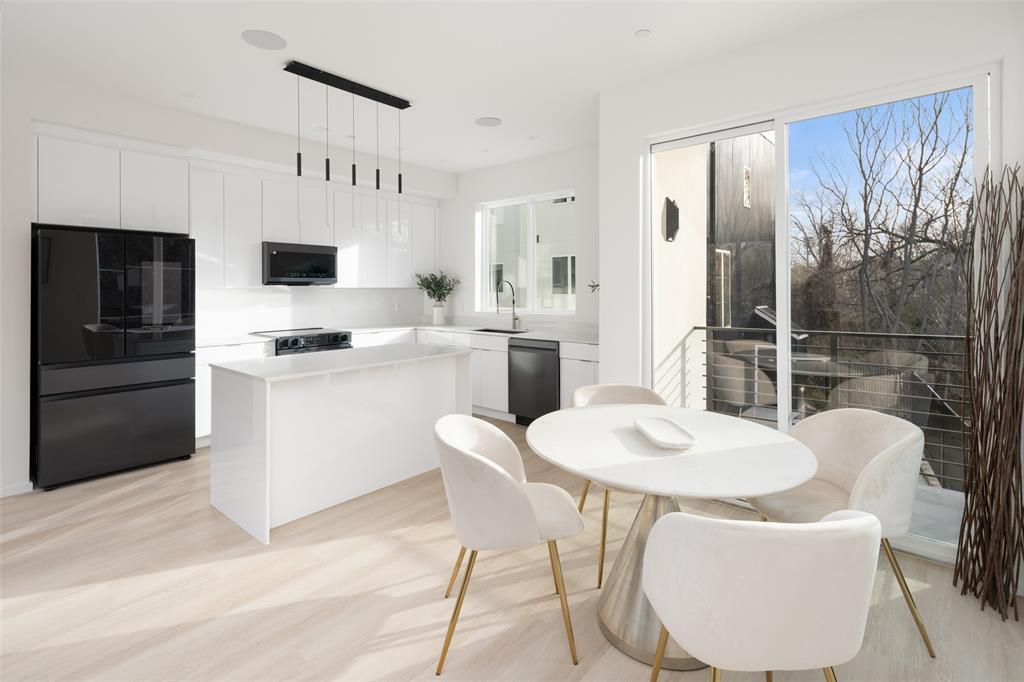 Dining area with light wood-style flooring