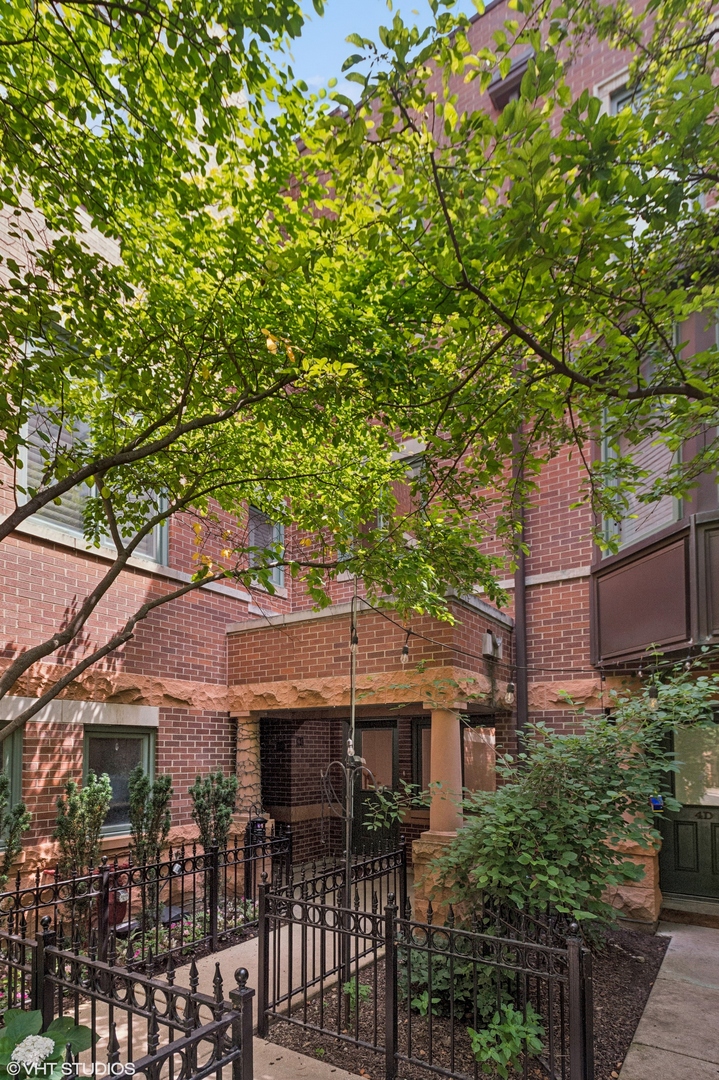BEST AND FINAL BY 2:00PM ON TUESDAY JULY 29TH. Highly desired Altgeld Club 2bed/2 bath townhome with extra office/den/family room space, attached 2 car garage and private roof deck, ideally located in Lincoln Park. This "hidden gem" community offers a rare opportunity to enjoy city living in the comfort of a quiet set back complex with abundant gorgeous green space in landscaped courtyards. Enter from the front front patio or from the coveted 2 car attached garage into this classic 2001 built townhome. The 1st level offers a den/family room/office option and storage area under the steps.  The second level includes a kitchen with views of the tree filled green private courtyard, hardwood floors, gas fireplace, full bathroom, living room, separate dining area, and balcony for grilling. The primary suite and 2nd bedroom occupy the 3rd floor, with natural light, abundant closet space, and a full shared bath with a Jacuzzi tub, and a separate shower. The second bedroom is perfect for guests, full time bedroom use, or even a home office. The 4th level welcomes you with bright light from a central skylight up to a huge private rooftop deck that is equally suited for lounging, outdoor dining, pergola, tv, or evening cocktails. This  townhome includes guest parking, and an optional in-complex storage unit. This prime Lincoln Park location is in the Oscar Mayer school district, Lincoln Park High School, close to public transportation, parks, great restaurant dining, nightlife, and Lake Shore Athletic Club. Low assessments and a strong community, this home checks all the boxes for your dream Chicago lifestyle.