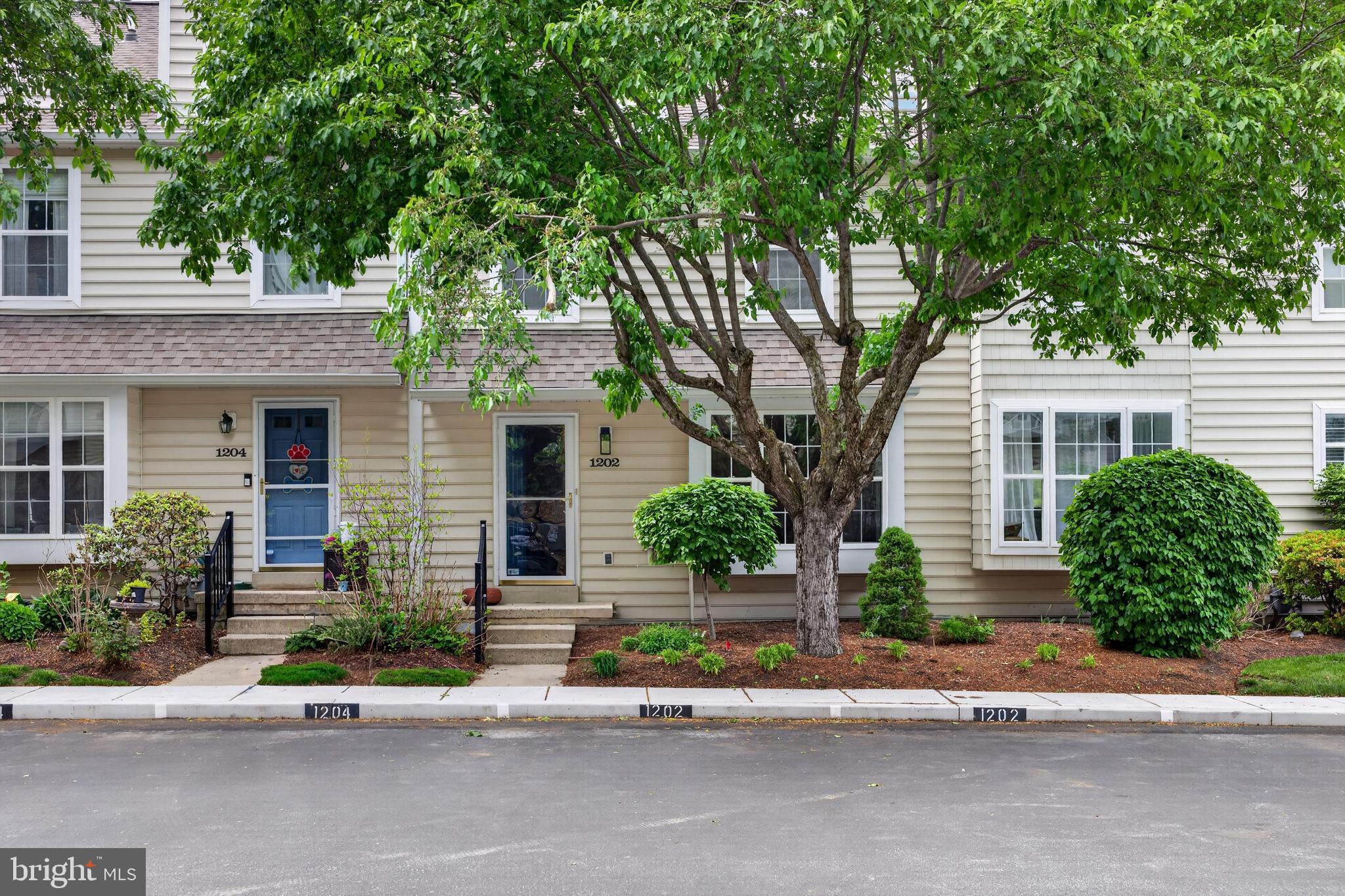 Welcome to this impeccably maintained 3-bedroom, 2.5-bath townhome nestled within the coveted Marsh Harbour community and the award-winning Downingtown Area School District. Thoughtfully designed with timeless finishes and an effortless flow, this residence offers an elevated blend of comfort, style, and everyday functionality.The main level showcases newly finished hardwood flooring, completed in 2026, and a spacious living room anchored by a charming wood-burning fireplace and extra large window seat — an inviting setting for both intimate evenings and entertaining guests. Just beyond, the dining area opens through sliding glass doors to an expansive oversized deck, creating a seamless indoor-outdoor living experience surrounded by tranquil views of Marsh Creek. The well-appointed kitchen features a center island, abundant cabinetry, dry bar with wine fridge and a desirable gas stove, combining both style and functionality for everyday cooking and entertaining. Not only do you have views of the Lake from the deck but also the Dining Room and Kitchen. A conveniently located powder room completes the level.Upstairs, the serene primary suite serves as a private retreat, highlighted by picturesque lake views, a custom walk-in closet, and a beautifully remodeled en-suite bath with double sinks and a walk-in shower. Two additional bedrooms, a full hall bath, and a thoughtfully positioned second-floor laundry area provide both comfort and convenience. The entire upper floor has newly finished hardwood flooring as well!The finished walkout lower level, enhanced with newly installed carpeting, offers exceptional versatility — ideal as a media lounge, executive home office, fitness studio, or playroom. The lower level also includes a bonus unfinished storage area.Residents of Marsh Harbour enjoy access to an impressive collection of resort-style amenities, including a swimming pool (also a Kiddie pool), hot tub, tennis court, fitness room, and clubhouse, all ideally situated near premier dining, parks, and major commuter routes. Marsh Creek State Park is a short stroll away. Very few come on the market completely updated. Come see it before its gone!