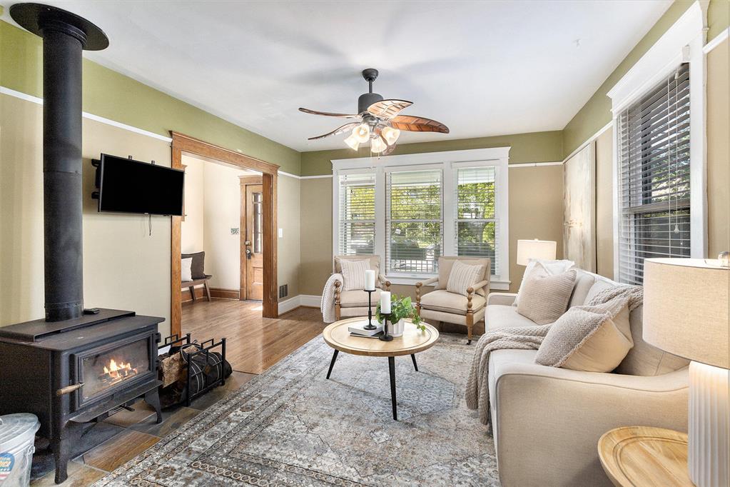 Ready to make this your forever home?   Traditional styling with important updates such as kitchen, first floor full bath, new a/c in 2023. Outstanding features set this home apart from other downtown addresses as they include the private/treed backyard, corner lot and 2.5 car garage with storage and workshop. Need first floor bedroom, we've got it. How about 4 addl bedrooms upstairs with another full bath. Do you just adore a front porch spring? How about a back deck and LL patio? All this with a walking score of 99!  Top rated schools nearby as well as restaurants, shopping and entertainment.  Near U of M campus, M-14, US 23 and I-94. Ready for immediate occupancy. Home Energy Score of 1. Download report at stream.a2gov.org