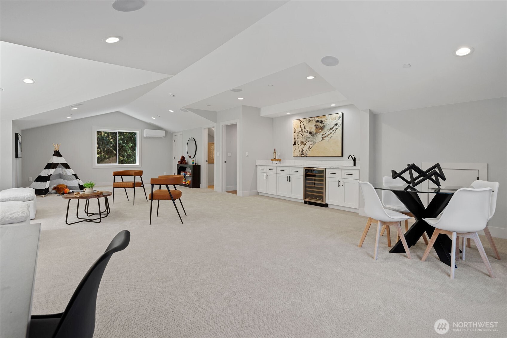 Welcome to your enormous Family Game Room. Above Beverage Bar is wired for your Big Screen. Sit back and enjoy a movie or time with loved ones.
