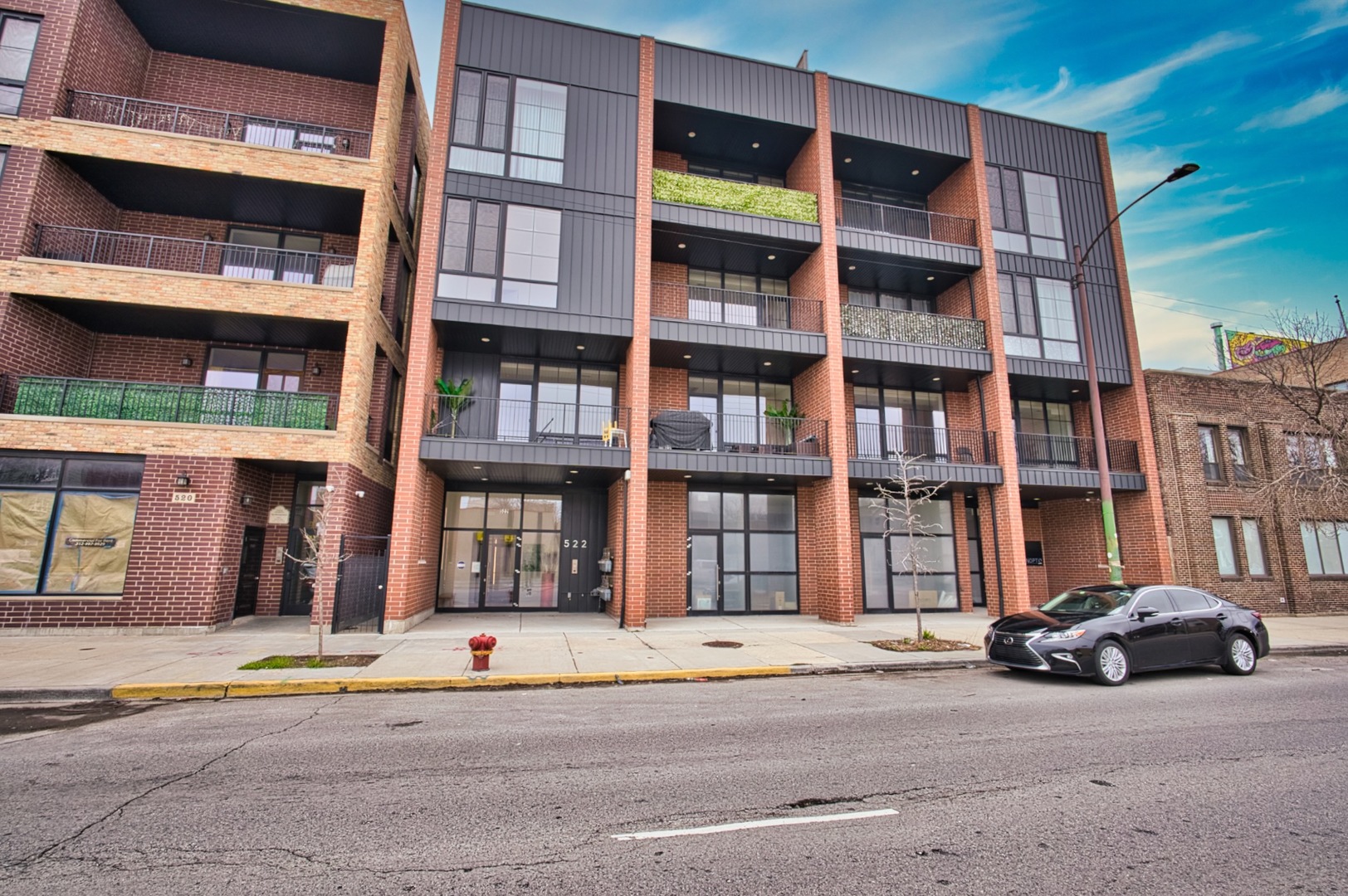 Welcome to 522 N. Western Ave, Unit 201! This beautiful 2400 sq ft NEW CONSTRUCTION 3 bed/2.5 bath gem just hit the market in West Town! This unit features 14 ft ceilings, upgraded appliances including a new sub-zero fridge, wolf range, new microwave, electric dark blinds and new washer/dryer. With French doors from the kitchen to the living area opening your way onto a beautiful front balcony. Beautiful hard-wood floors throughout including heated bathroom floors. Walk your way onto a spacious 800 sq ft private outdoor terrace! Includes 1 indoor garage parking spot.