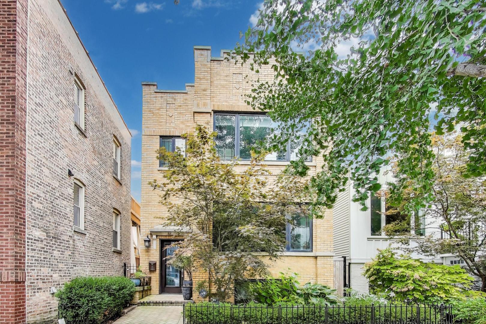 Spacious 6-Bedroom Roscoe Village Home with 4 Bedrooms Up in Coveted Audubon School District!    Built in 2016, this 4,000+ sq ft residence combines modern elegance with thoughtful family design. The open main level boasts a chef's kitchen with Thermador appliances, quartz counters, and a generous island, flowing to a sun-filled family room with fireplace and access to a private deck and fenced yard.    Upstairs, all four bedrooms are conveniently located together, including a serene primary suite with spa-inspired bath and walk-in closet. The lower level offers a large recreation room, wet bar, media room, two additional bedrooms, and dual laundry centers.    Enjoy a rooftop deck over the 2-car garage and an unbeatable location near Roscoe Village's shops, dining, parks, and Brown Line.