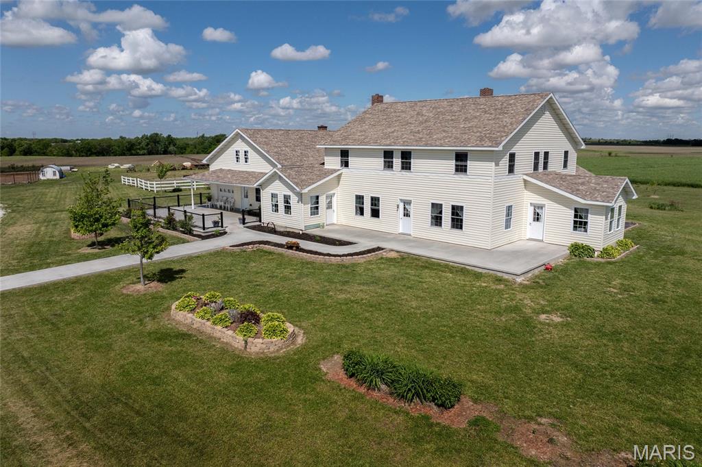 Homesteader’s dream meets horse property on this 28-acre Amish homestead in Revere, Missouri. A mix of tillable ground and pasture, a large garden, and a scenic pond make this property ideal for self-sufficient living or a small-scale farm. The expansive home offers over 4,700 finished sq ft with 6 bedrooms, 2 kitchen areas, oversized living and dining spaces, main-floor laundry, and a massive unfinished basement plus upper-level storage. The home is off-grid with no electric or gas service but has running water, a septic system, and electric available at the road. It’s heated with a wood stove and features vinyl siding, a shingled roof, and double-pane replacement windows. Outbuildings include a 32’x52’ insulated and finished workshop, a 48’x64’ horse barn with stalls and a tack room, a 48’x90’ utility barn, and several smaller buildings—perfect for livestock, equipment, or expanding your operation. Whether you’re starting a homestead, raising horses, or simply looking for space to live freely, this versatile property offers endless potential. Showings by appointment only.