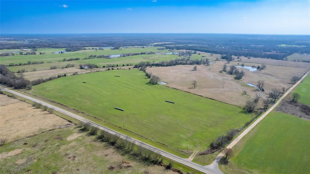 Many opportunities here with over 113 ag exempt acres and tremoundous ROAD FRONTAGE ON 3 SIDES! This property is being divided off a larger ranch and provides buyer will opportunity for permanant residence,  ranch operations,  rental income, future  investment, possible future subdivision etc. This sandy soil property is fenced and cross fenced with 4 stock tanks, farm house, multiple barns, working pens, improved grass for productive ranching operation. The 1687 sq ft home (currently rented) is located on the southeast corner of property being an old dairy home place with large trees, barns, shed and corrals that hold many possibilities and functions. There is NO FEMA floodplain or Known Restrictions on this property allowing usage of the entire tract. There is 53 additional acres available (mls #20833305) with large hay barn located directly across the road from home to increase your acerage.  Located in the sought after Como Pickton CISD and only a few miles from I30, between the great communities of Sulphur Springs, Mt Vernon, Lake Cypress Springs  and Winnsboro for some of the best restaurants, festivities and recreation in all East Texas. Estimated Road frontage CR 2376 - 2145', CR 2377 - 2560' and FM 3105 - 1450'