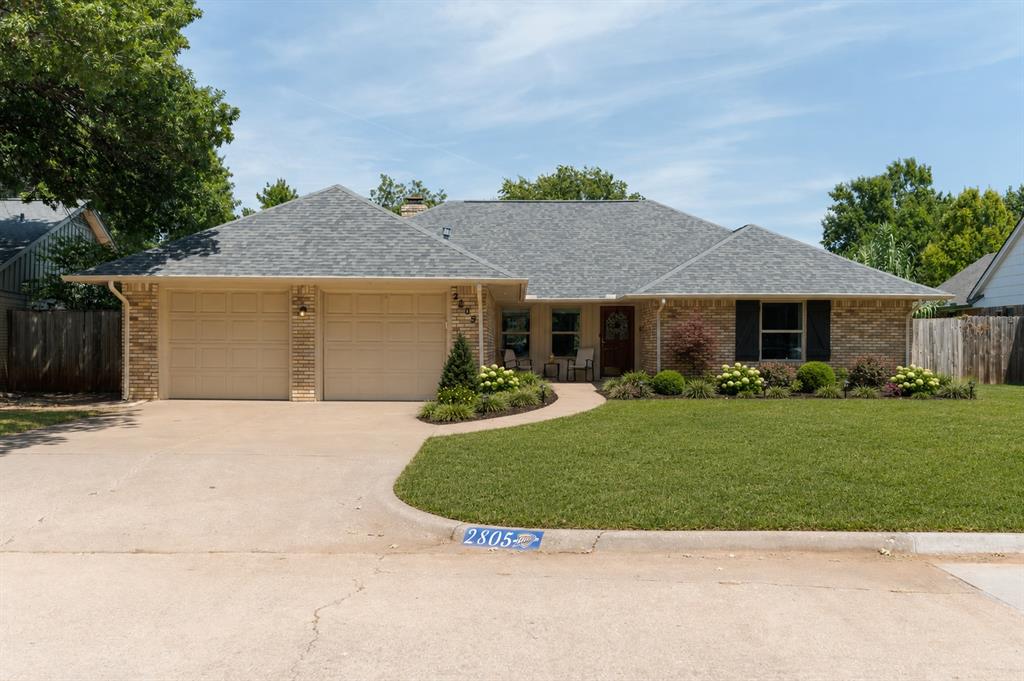 What a find! This home in NW OKC’s Camelot neighborhood is perfectly positioned in the most convenient location in all of the city- putting you just minutes to The Village/Nichols Hills, Edmond, downtown and Lake Hefner. The interior is spacious and welcoming. A large living room is centered around a fireplace with built-ins, with a formal dining or second living room off to the side (currently utilized as a home office space or could easily be framed out to be a dedicated study or play room). A dining room opens to an efficient kitchen, complete with an abundance of cabinetry, coffee bar and great recessed lighting. Beautiful vinyl windows give a polished look throughout the home. The master suite features a walk-in closet, full bathroom and sliding doors leading out to the covered patio. Two secondary bedrooms enjoy access to the hallway full bathroom. The laundry room is massive with tons of storage and a powder bathroom. Impactful upgrades include tankless water heater [2025], sewer line [2020], electrical panel, AC compressor [2024] & roof [2022]. A quiet block with quick access to everywhere you need to be- welcome home!