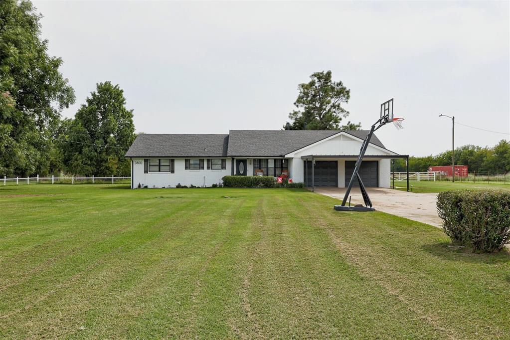 Paradise Acreage! Completely updated 3 BR, 2 BA 1,800 Sq. Ft. home with Office/Game Room sitting on 4.45 acres, along with a large car workshop, 2 outdoor storm shelters, 2 outdoor storage buildings, a horse barn, and a motocross course.  Modernized in 2025 with new roof and many extras! New business construction nearby. Won't last long at this price!!