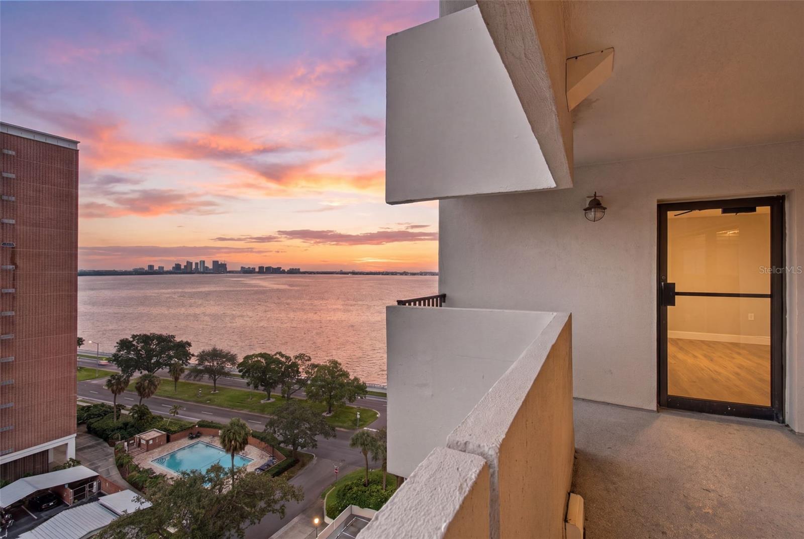 Welcome to Residence 1106 at The Pinnacle, an 11th-floor, two-bedroom, two-bath condominium along Tampa's iconic Bayshore Boulevard in South Tampa. This 1,178-square-foot home offers downtown Tampa skyline views, partial Tampa Bay/harbor water views and sunset views from its private balcony, plus a living room/dining room combination, a main-level primary suite with en-suite bath and walk-in closet, and a kitchen with plenty of storage and counter space.Interior updates include renovated bathrooms, stainless steel appliances (all included, reported under five years old), luxury vinyl plank flooring in the primary living areas with tile in the kitchen, laundry room and second bedroom, and an inside laundry room. The unit also includes a private storage unit and two assigned under-building parking spaces (one secure garage space and one additional space).The Pinnacle is a full-amenity high-rise community with a waterfront pool, two fitness centers with separate cardio and weight rooms and a sauna, two observation decks (one overlooking Bayshore Boulevard), a recreation room with library, a private dog area, bike storage, and guest suites available for visiting family and friends. The building offers 24x7 front-desk/guard-monitored entry and secure garage parking. HOA fees are reported to include cable, internet, water, sewer, trash, building insurance and exterior/grounds maintenance (buyer to confirm current monthly fee and full inclusions with the association).Directly across from the scenic Bayshore Boulevard waterfront promenade (popular with walkers, runners and cyclists) the home is minutes from downtown Tampa, Hyde Park Village, Water Street, MacDill Air Force Base and Tampa International Airport. Association approval is required for buyers; pets welcome per association guidelines. Unit is vacant and available for a quick close.Buyer/buyer's agent to verify all room dimensions, square footage, HOA fees, association rules, and any recent milestone inspection/SIRS or assessment status with the condominium association.