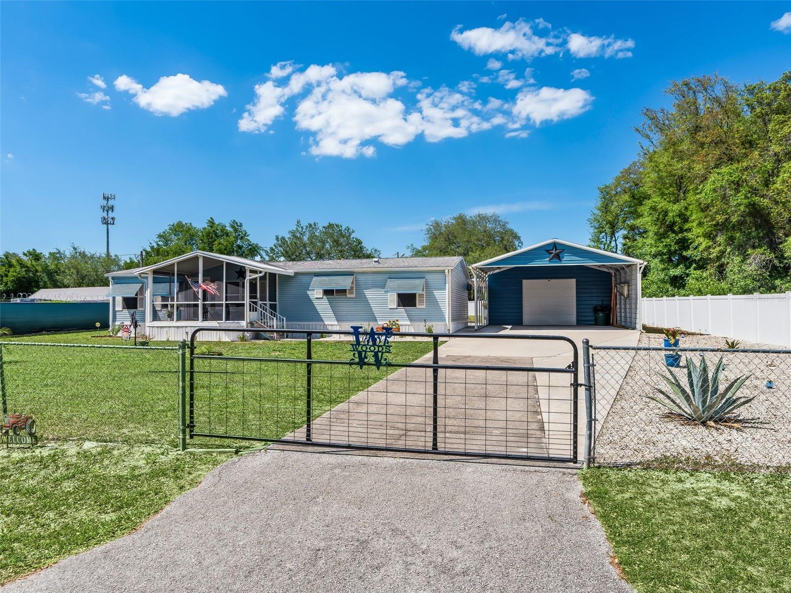 **POOL HOME + MASSIVE 24' x 51' SHOP!** If you need space for your toys, hobbies, projects, storage, or just about anything else, this property delivers! The impressive **1,224 sq. ft. shop**, added in 2022, features **spray-foam insulation and a mini-split A/C system**, giving you an incredible amount of usable space year-round.And that's just the beginning! Enjoy your own backyard retreat with a **swimming pool added in 2023**, surrounded by composite decking and a 4' aluminum fence. The property also features a **6' vinyl privacy fence added in 2025**, creating a great outdoor space for relaxing and entertaining.Inside, the home has received numerous updates, including **whole-house plumbing, kitchen cabinets and countertops, flooring, appliances, ceiling fans and light fixtures**, along with fresh interior paint. An **electric fireplace** adds a cozy touch to the living area and is included with the home.Additional improvements include a **covered concrete patio, newer front storm door, screened front porch/lanai, newer rear door and storm door, composite front porch flooring**, plus a **10' x 12' storage shed/outbuilding** for even more storage.The home also includes **select furnishings**, including the **living room furniture, dining room table and chairs, wicker patio/lanai furniture and electric fireplace**, along with the **refrigerator, range, microwave, dishwasher, washer and dryer**.**LOOKING FOR A WORK-FROM-HOME OR BUSINESS OPPORTUNITY?** The property's zoning allows for business use, opening the door to a variety of possibilities. Combined with the **massive 1,224 sq. ft. shop**, this could be an exceptional setup for someone looking to operate a business from home while still enjoying all the comforts of residential living. With a **pool, oversized 1,224 sq. ft. shop, additional storage building, extensive updates, business-use potential and included furnishings**, this property offers features that are hard to find all in one place. **Schedule your showing and come see everything this property has to offer!**