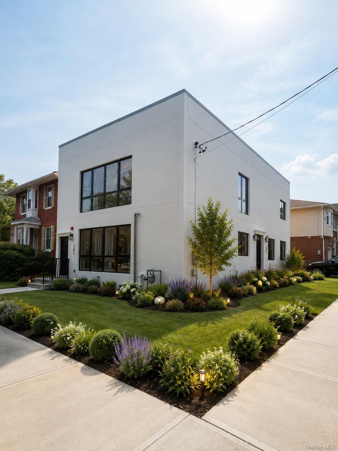 Welcome to this newly built luxury single-dwelling residence, ideally situated on a prime corner lot in the heart of Bayside. Set on an approximately 3,750 sq ft lot with approximately 2,500 sq ft of interior living space, this detached home combines modern design, spacious living areas, and everyday convenience. The home is equipped with natural gas for both cooking and heating.Interior Features.First Floor:An inviting open-concept layout featuring a spacious living room, dining area, and modern kitchen. The first floor also includes a versatile recreation room that can be used as an additional bedroom, along with a full bathroom.Second Floor:The second floor offers an additional living area, three well-proportioned bedrooms, two full bathrooms, and a flexible den/bedroom space that can be customized to suit you need.Fully Finished Basement:The finished basement features a separate entrance and offers a versatile space ideal for recreation, a home office, guest accommodations, or additional living space, along with a dedicated laundry area.Outdoor Features:Enjoy a private rooftop terrace with the potential to create your own outdoor retreat, garden, or entertaining space. A private driveway provides convenient parking for multiple vehicles.Prime Bayside LocationIdeally located within walking distance of the Long Island Rail Road Bayside Station, providing convenient direct access to Manhattan. The home is also close to the Q12, Q13, and Q15 bus lines, as well as major roadways including I-295 and the Cross Island Parkway.Enjoy easy access to shopping, dining, and everyday conveniences along Bell Boulevard and Northern Boulevard.Located within an excellent school district, this beautiful detached residence offers the perfect combination of modern comfort, versatile living space, convenient transportation, and an exceptional Bayside location—an ideal home for comfortable living.