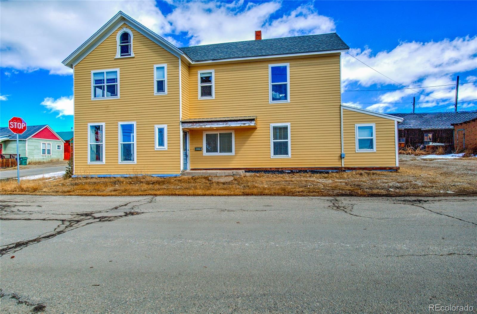 VICTORIAN WITH VIEWS! Windows galore allow for the sunlight to flood almost every corner of this home and to revel in Leadville's views in every direction. The period staircase is something that can't be replicated. Three bedrooms, large living areas, large kitchen, and tall ceilings make this home feel just grand! The large corner lot consists of four city lots - plenty of room to expand by building a garage or ADU. A large barn and storage shed mean that all of your gear stays accessible year-round! There's additional, unfinished square footage upstairs that could allow for an additional bedroom and bathroom or...? Use your imagination! Just a couple of blocks from the action in Historic Downtown Leadville and the Mineral Belt Trail. You'll find this charming home very comfortable and welcoming! Charming details abound!  https://studio-kiva-photography.seehouseat.com/2375946?idx=1