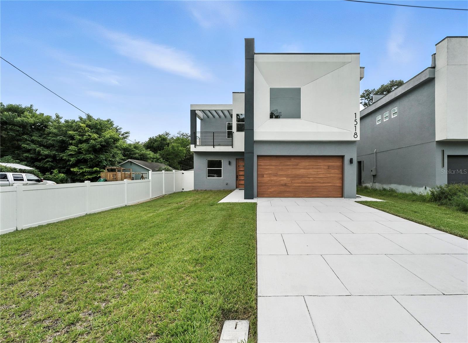 New price adjustment! 

Welcome to 1518 Cloverlawn Avenue — a stunning, newly reimagined modern day home nestled in the vibrant Hourglass District of Orlando. This 5-bedroom, 4.5-bathroom property offers nearly 3,750 square feet of beautifully designed living space, including an attached 1-bedroom, 1-bathroom guest house/ADU, perfect for rental income, a home office, or extended family.

The main home features a spacious 4-bedroom, 3.5-bath layout, thoughtfully updated with modern finishes, an open-concept floor plan, high ceilings, and oversized windows that flood the space with natural light. The gourmet kitchen includes quartz countertops, sleek cabinetry, and a large island perfect for entertaining. A luxurious primary suite offers a spa-like ensuite bath and generous walk-in closet.

Outside, you'll find a fully fenced spacious yard, private patio, and professional landscaping—creating a serene backdrop for outdoor gatherings. The attached guest suite offers its own private entrance and approximately 1,000 square feet of stylish, self-contained living space with full kitchen, laundry, and private driveway access.

Situated on a quiet street with no HOA, this home is just minutes from Downtown Orlando entertainment, Lake Como, SODO, and top-rated schools including Lake Como K-8 and Boone High. Commuting is a breeze with easy access to I-4, 408, and Orlando Health.

Whether you're looking for a versatile investment property, space for multigenerational living, or a turnkey home with income potential, 1518 Cloverlawn Ave delivers unmatched flexibility and modern comfort. PRESENT ALL OFFERS.