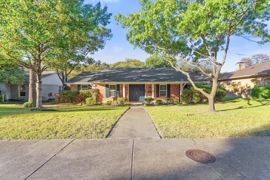 Beautiful home in sought after East Dallas, close to White Rock Lake.  The front porch welcomes you home. Home is move in ready with the following improvements-all completed October 2025, includes fresh paint, all interior and exterior, Roof and gutters, 6 ft cedar plank fence with steel posts and  Carpet in bedrooms. Kitchen includes stainless steel appliances, including refrigerator and granite countertops. Home also includes newer Vinyl windows, Low-E Argon filled, with a lifetime warranty on the seals.  Back yard includes a space for a dog run and lots of outdoor space to make your own.  You can make the 4th bedroom into an office or whatever suits your needs.  Brick Fireplace with gas logs to cozy up with this winter! HVAC Condenser and coil replaced in 2021.  You just need to move in!