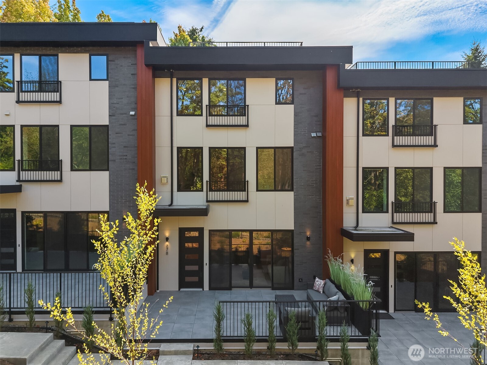 The W Townhomes bring a fresh perspective to Bellevue luxury, where sophisticated design, thoughtful floor plans, and an extraordinary setting come together in one exceptional address. Imagine coming home to unobstructed views of Downtown Bellevue, the Botanical Gardens at your doorstep, and a rooftop terrace made for taking it all in. These beautifully crafted four-bedroom residences feature expansive open-concept living, floor-to-ceiling windows, elevated finishes, and seamless indoor-outdoor spaces designed for modern living and effortless entertaining.  The One-of-a-kind private two-car garage is an exceptional feature that sets The W apart and adds a level of convenience and privacy rarely found in townhome living.  Set alongside the Botanical Gardens in a peaceful, nature-inspired setting, yet just minutes from Downtown Bellevue’s premier dining, shopping, parks, entertainment, and business district, The W offers the best of both worlds.