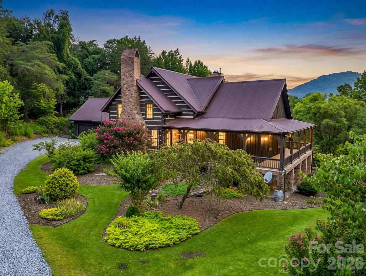 Exceptional Authentic Log Home at Lake Lure NC, featuring Handworked Huge Logs with Dovetails, 4 Beds/5 Baths, First Floor Primary with personalized bath suites, Lots of Beds & Bunks for Large Gatherings, Central Chefs Kitchen with Scullery Open to Dining, Family Room & Entertaining, Soaring Beamed Ceilings,  Library Loft, Top Notch Main Level Laundry Mudroom, Wrap Around and Screened Porches, Year Round Mountain Views, Gorgeous Landscaped 1.46 Acre Yard, Brilliant Drive Thru Attached Garage with Double Doors both Front & Rear with Circular Drive, Lower Level Third Car Garage for your Boat & Toys, Finished Basement. Located in Rumbling Bald on Lake Lure with Community Beach, Two 18 Hole Mountain Golf Courses, Indoor & Outdoor Swimming Pools, Tennis/Pickle Ball Courts, Fitness Center, Bars & Restaurants, Marina, and so much more!! You will be impressed!!