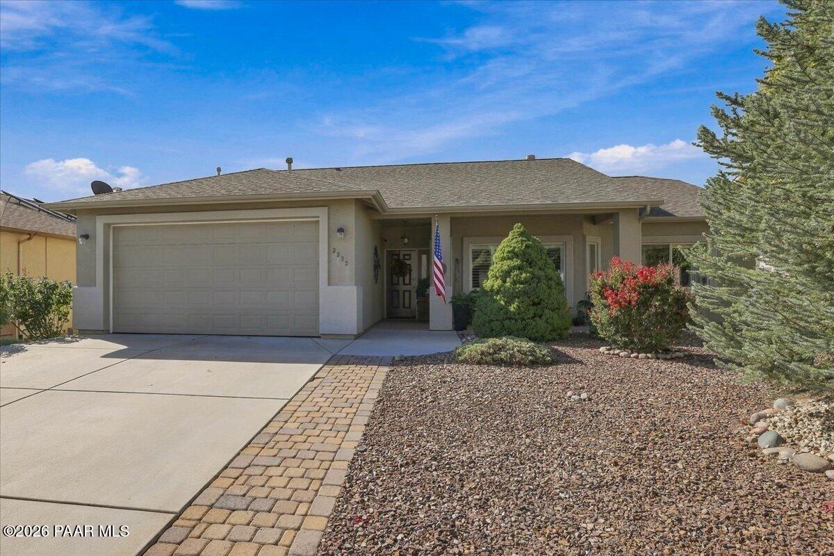 Welcome to this gorgeous, beautifully updated Granville home, where comfort, style, and low-maintenance living come together in an exceptional package! Featuring 3 bedrooms, 2 bathrooms, and an extended, extra wide 2 car garage, this home offers thoughtful updates and inviting spaces inside and out. One of the home's standout features is the sunny, climate controlled Arizona Room, complete with an AC/heat mini split system and electrical outlets. Whether used as an additional family room, den, hobby space, or home office, this versatile space adds valuable living area and opens to the beautifully designed backyard. Step outside and discover a backyard transformed by expertly designed ZebraScapes landscaping. Enjoy a garden area, raised garden beds, attractive borders and walkways, artificial turf, updated irrigation, solar lighting, and an impressive variety of fruit trees, including 2 pear, 1 apple, and 1 plum. Multiple covered and uncovered patios and seating areas create wonderful spaces for entertaining, relaxing, gardening, or simply taking in the views of Glassford Hill. Inside, beautiful solid surface, wood like waterproof LVP flooring and newer carpet complement the home's fresh, updated feel. The kitchen features quartz countertops, black stainless steel appliances, a walk-in pantry, and recently added above and under cabinet lighting. Newer paint enhances the primary bedroom and bathroom, kitchen, dining, and living areas. The recently remodeled primary bathroom is a true retreat, with approximately $30,000 in upgrades, including a spacious walk-in shower, charming accent wall, painted cabinetry, new light fixtures, and new faucets. The vaulted ceiling living room is filled with natural light from the bay picture windows, beautifully finished with plantation shutters. Additional updates include five new ceiling fans throughout the home, new light fixtures throughout, and new window blinds throughout. The extended and extra wide 2 car garage provides abundant built in storage, including overhead shelving, while the 28 foot long driveway is also extra wide. Enjoy all that the Granville community has to offer, with three clubhouses featuring swimming pools, hot tubs, fitness centers, pickleball, tennis and basketball courts, pool tables, air hockey, ping pong, meeting rooms, and numerous clubhouse social activities. Residents can also enjoy playgrounds, a dog park, walking trails, and community RV parking (buyer to verify availability & pricing with HOA). Conveniently located less than five minutes from the Prescott Valley Town Center, with shopping, restaurants, and a movie theater, as well as Dignity Health Yavapai Regional Medical Center and Findlay Toyota Event Center. This exceptional home combines thoughtful updates, versatile living spaces, an incredible backyard, and an amenity rich community ready for its next chapter and waiting for you to write it!
