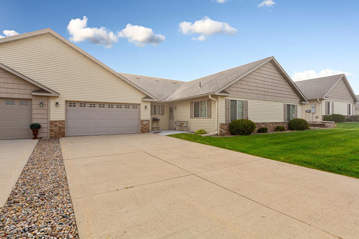 Welcome to this inviting 3-bedroom, 2-bathroom, 1-level patio home with a spacious 2-car garage, conveniently located on Mankato’s east side. With shopping, dining, and recreation nearby, you’ll enjoy both comfort and convenience. This one-level home offers an open floor plan that flows easily from the kitchen to the dining and living areas—ideal for gatherings and everyday living. Designed with zero-entry access from both the home and garage, it provides ease and accessibility for all. Large windows fill the space with natural light, creating a bright and welcoming atmosphere. The primary bedroom features a walk-in closet and an ensuite with a low-entry shower. Outdoors, a peaceful and private patio area adds the perfect touch for relaxation or entertaining. If you’re looking for a thoughtfully designed home with comfort, practicality, and style, this one is ready for you.